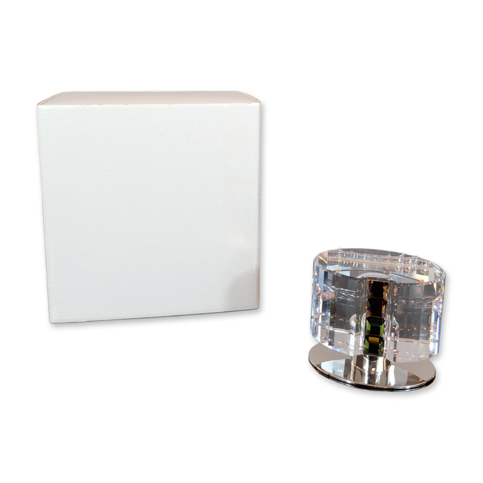 Swarovski Crystal Rainbow Candleholder: A highly collectible Swarovski crystal candleholder from the Rainbow series, designed by Stefan Umdasch. This piece features finely faceted clear crystal expertly paired with colored crystal accents