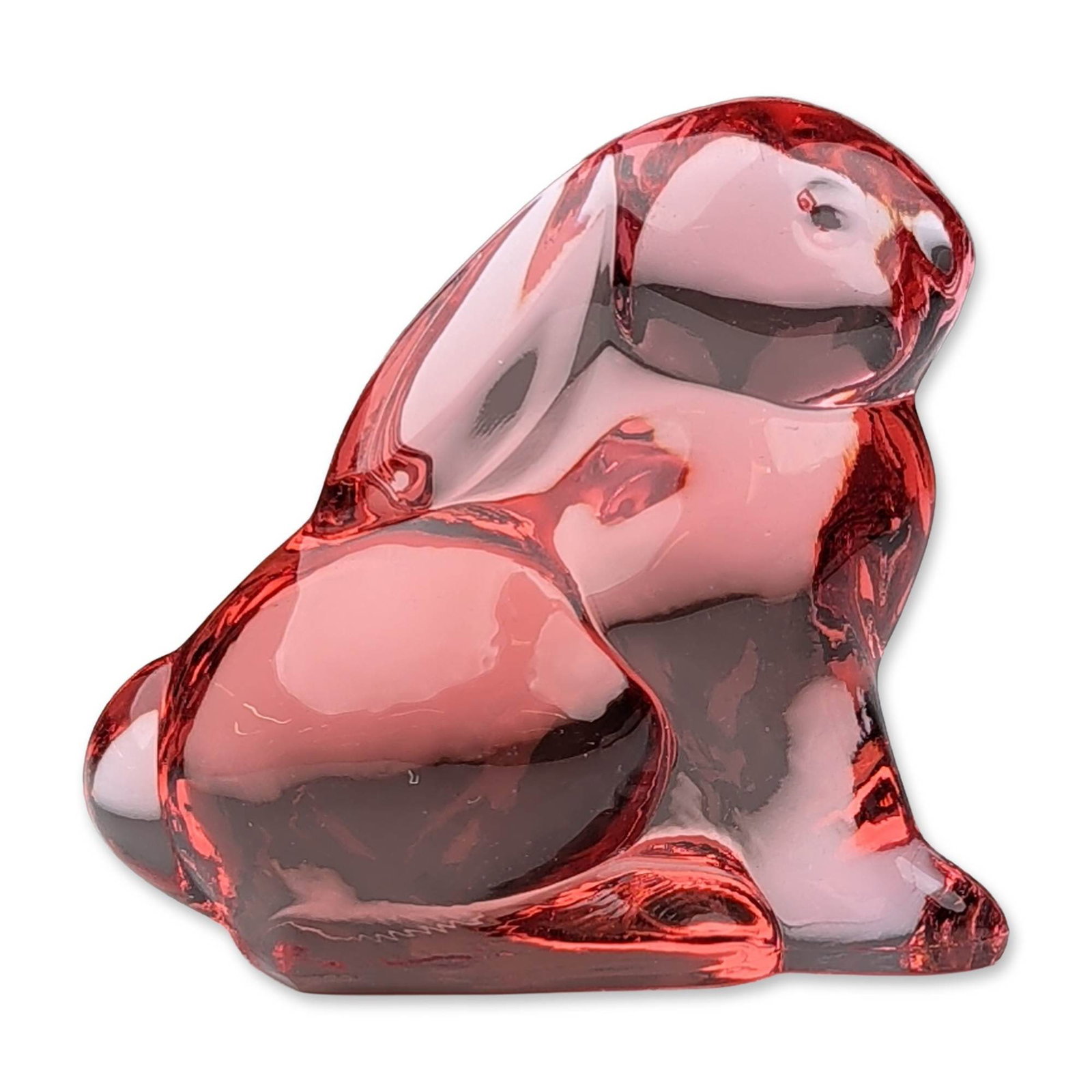 Moser Red Crystal Bunny Paperweight: A Moser paperweight depicting a seated bunny rabbit figurine in transparent ruby red crystal, featuring a minimalist, stylized form with smooth organic curves. The underside of the base bears an