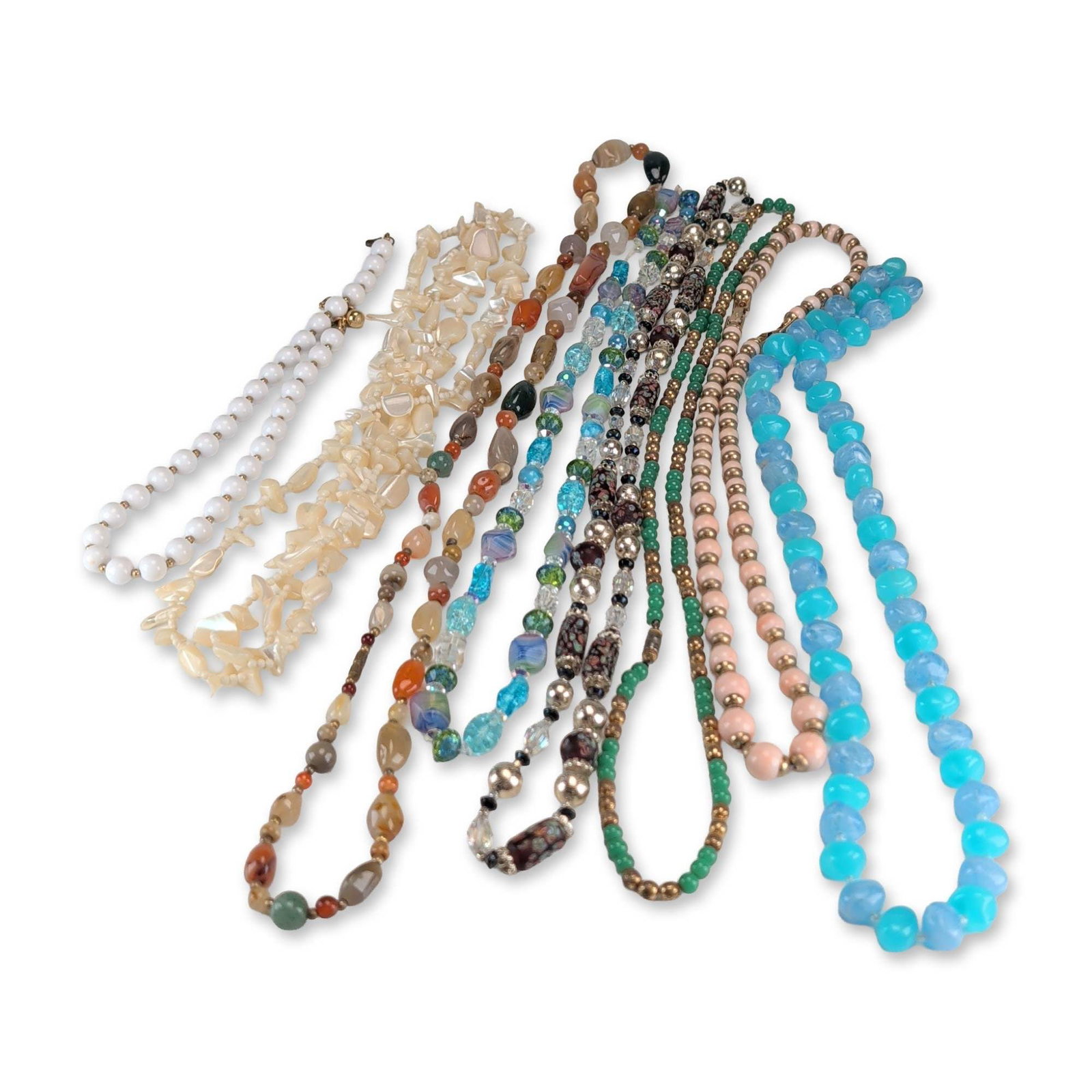 8pc Assortment of Vintage Costume and Stone Beaded Necklaces: Collection of assorted vintage beaded necklaces featuring various materials and styles. Included is a strand of graduated light blue frosted beads, a pink and gold-tone fluted metal bead strand with a