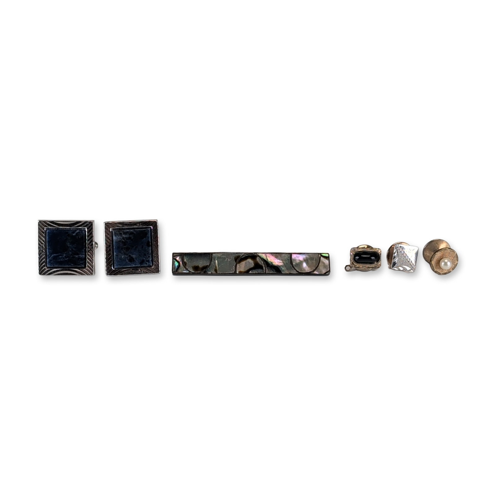 6pc Silver-Tone Clip and Cufflinks: Collection of items featuring a rectangular tie clip with a mosaic inlay of iridescent abalone shell. The group also includes a pair of square silver-tone toggle-back cufflinks with textured diagonal 