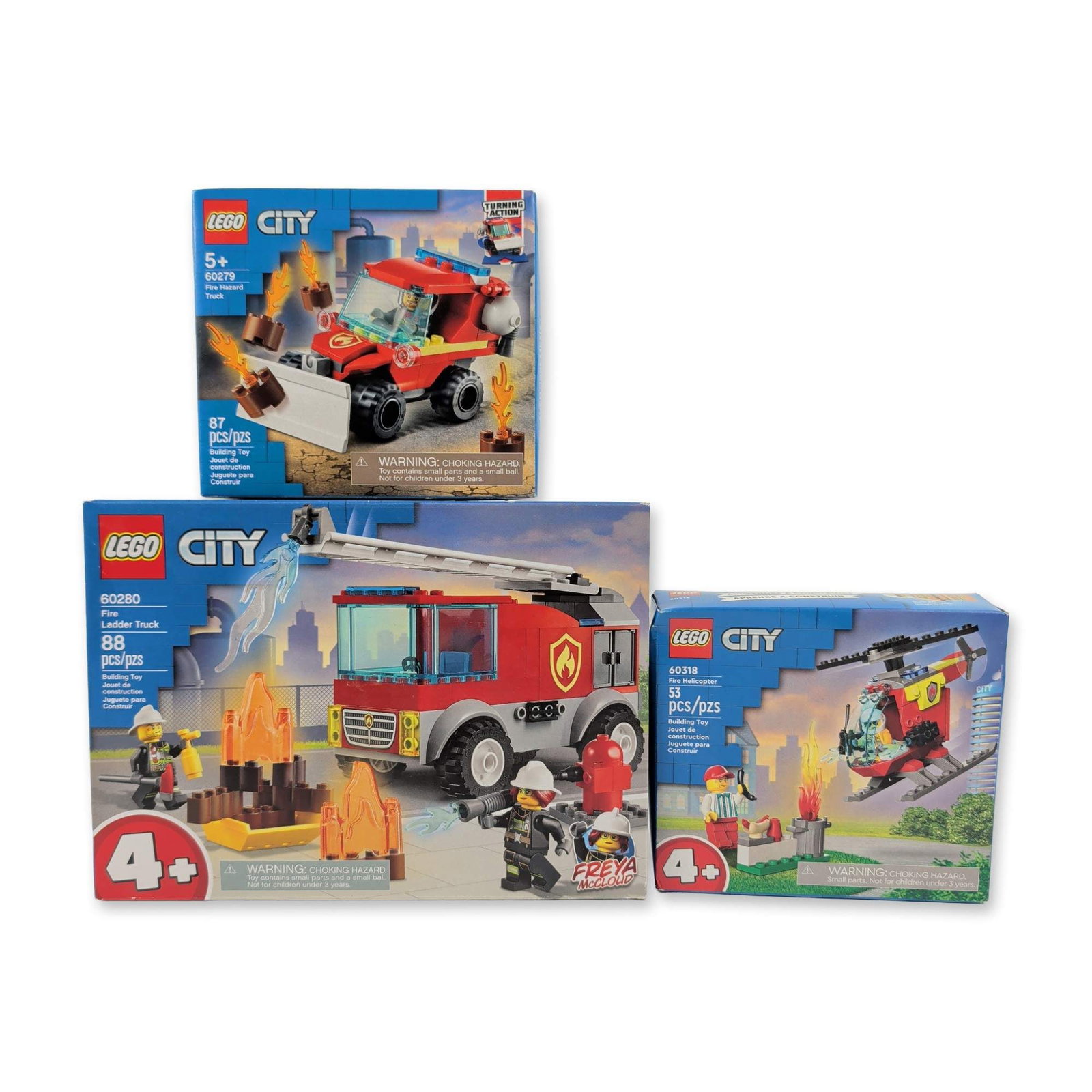 Three LEGO City Firefighting Construction Sets: LEGO. Three factory-sealed LEGO City construction sets with a firefighting theme, comprising Fire Hazard Truck 60279, Fire Ladder Truck 60280, and Fire Helicopter 60318. Molded plastic construction. S