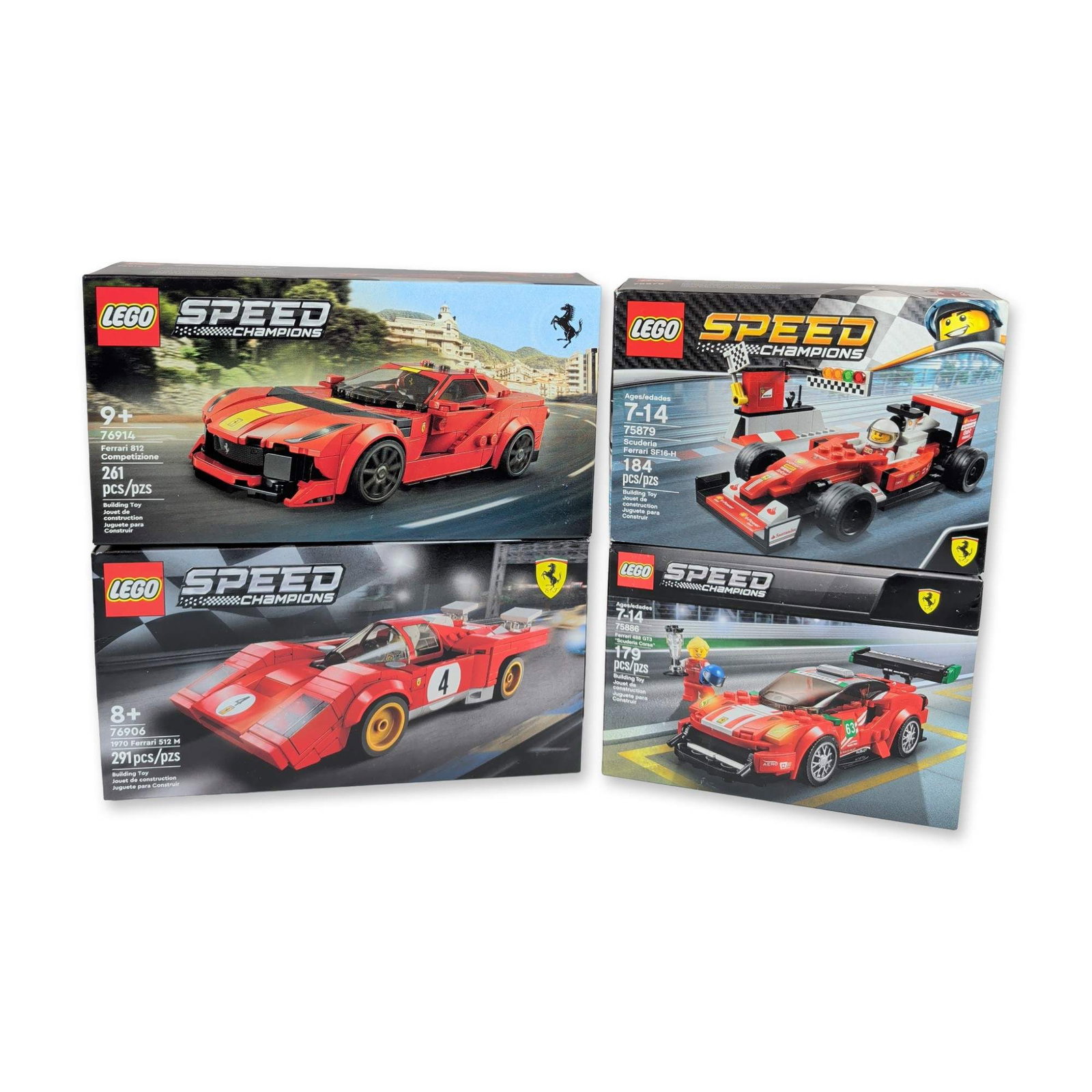 Collection of Four LEGO Speed Champions Ferrari Building Sets: LEGO Speed Champions collection featuring four licensed Ferrari vehicle sets. The grouping includes models of the Ferrari SF16-H (75879), Ferrari 488 GT3 Scuderia Corsa (75886), Ferrari 812