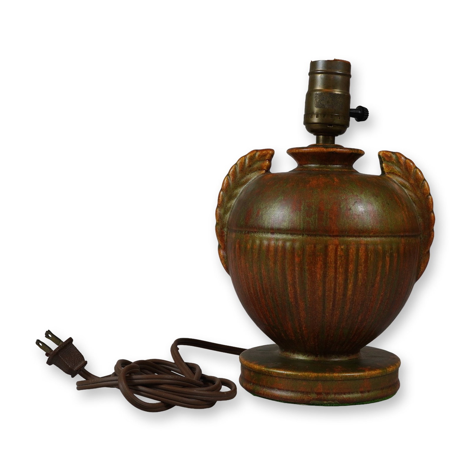 American Art Pottery Mottled Glaze Urn-Form Table Lamp Base: An American art pottery earthenware lamp base featuring an urn-form body. The vessel is decorated with a variegated matte drip glaze in mottled shades of forest green and reddish-brown, reminiscent of