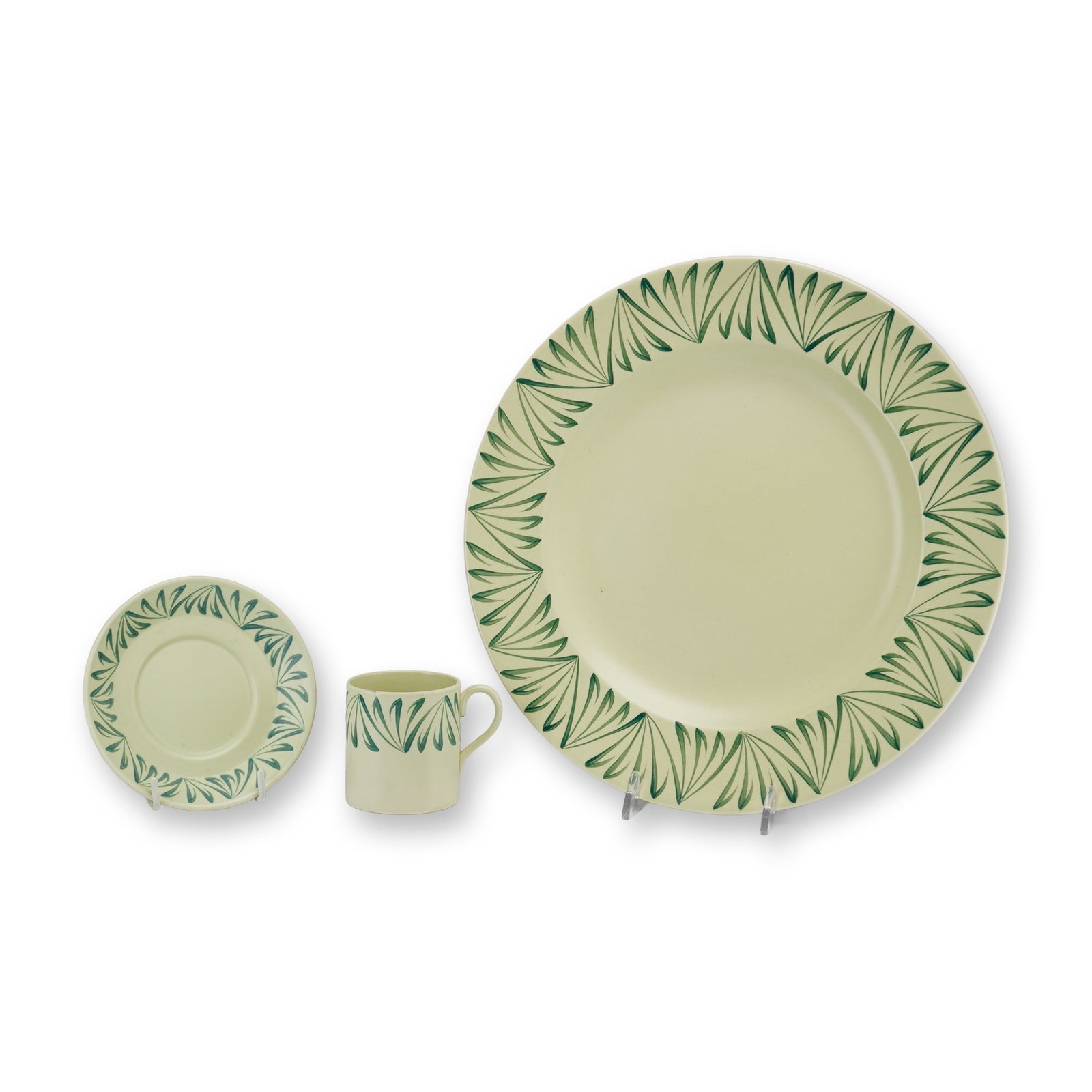 Three Piece Wedgwood Etruria Dinner Plate, Saucer and Demitasse Cup, April Green: A three-piece ceramic service set manufactured by Wedgwood at the Etruria factory in England. The set consists of one circular dinner plate, one saucer with a central well, and one cylindrical demitas
