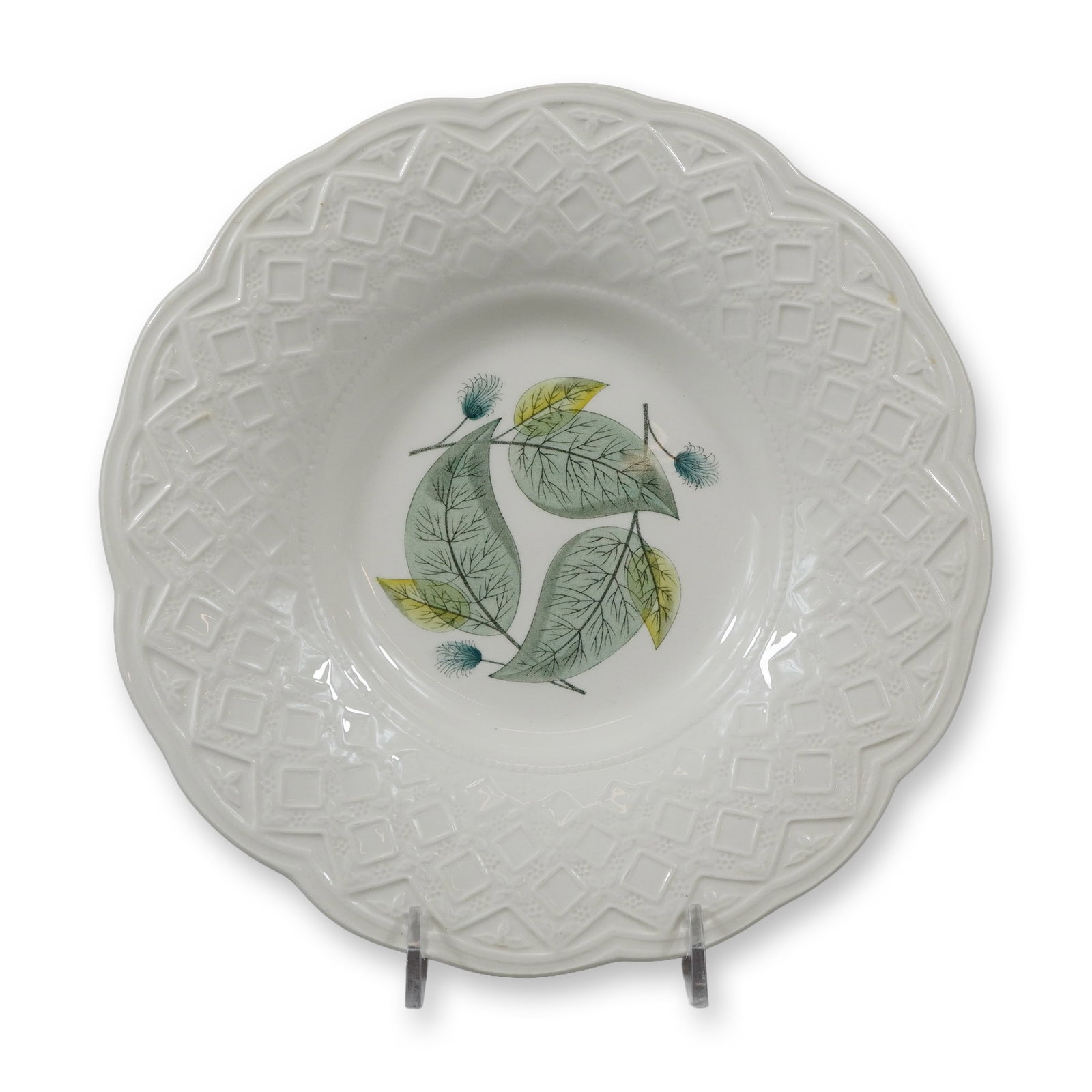 Wedgwood Etruria Trial Earthenware Plate in Woodbury Sepia Pattern: A Wedgwood fine earthenware soup plate or shallow bowl featuring a wide, scalloped rim with an embossed geometric lattice or diamond grid pattern. The center of the well is decorated with a transfer-p