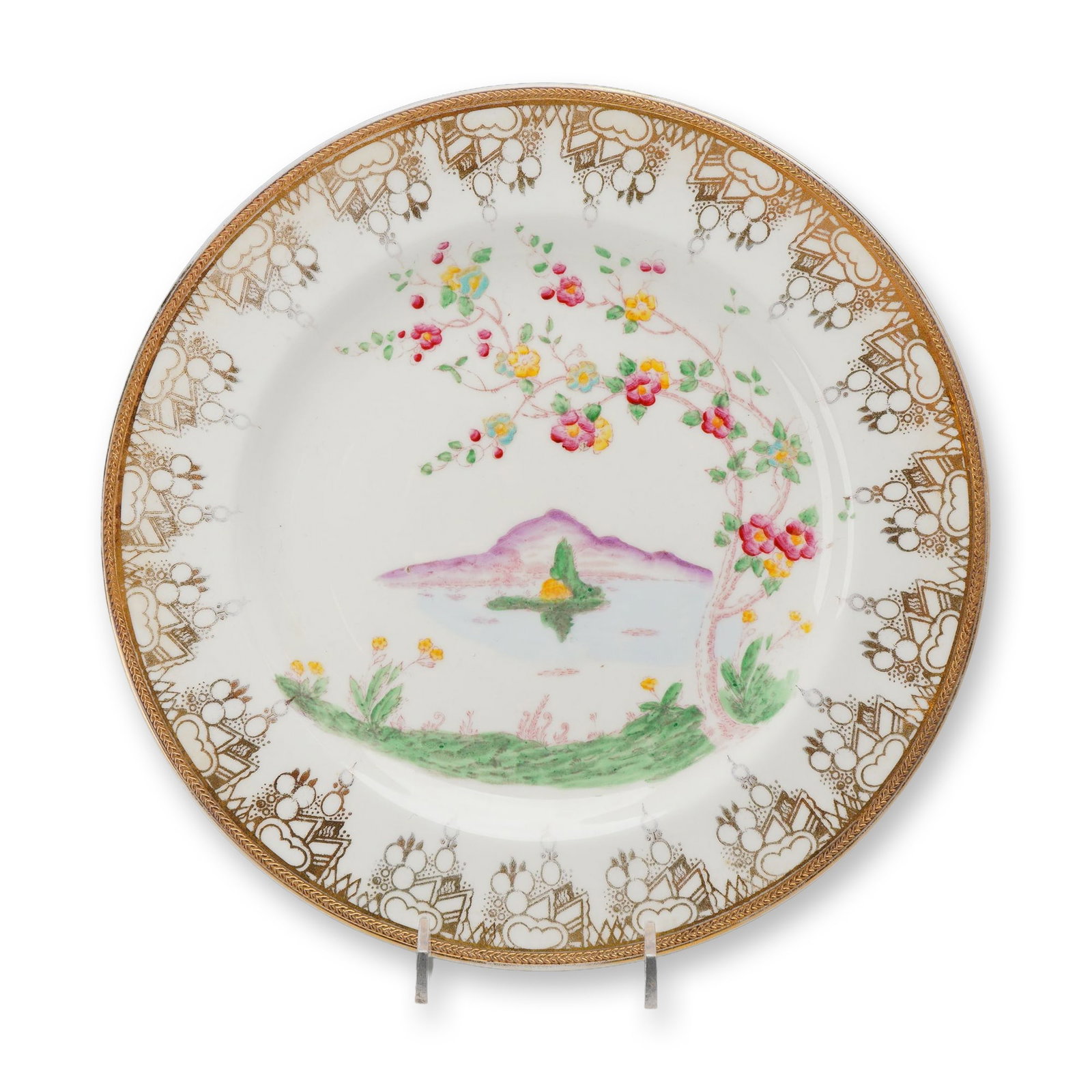 Wedgwood Hand Painted Bone China Chinoiserie Landscape Plate ca 1920 Rubin Collection: A fine bone china cabinet plate by Wedgwood featuring a central hand-painted Chinoiserie-style landscape. The scene depicts a lavender-hued mountain rising above a lake with a small island and dwellin