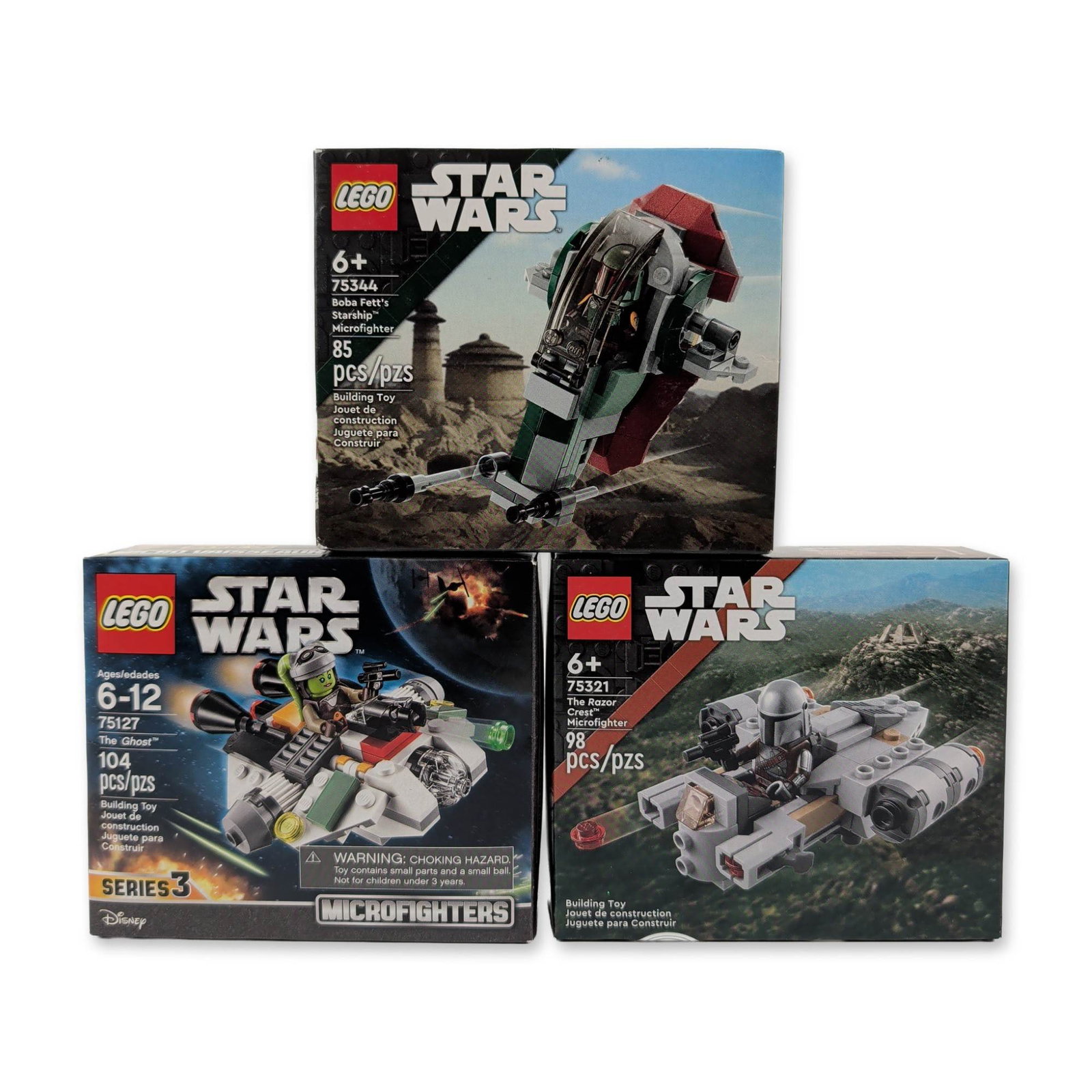 Three LEGO Star Wars Microfighter Sets: LEGO Group. Trio of Star Wars Microfighters building sets in plastic, including Boba Fett's Starship (75344), The Razor Crest (75321), and The Ghost (75127). Each set contains a character minifigure i