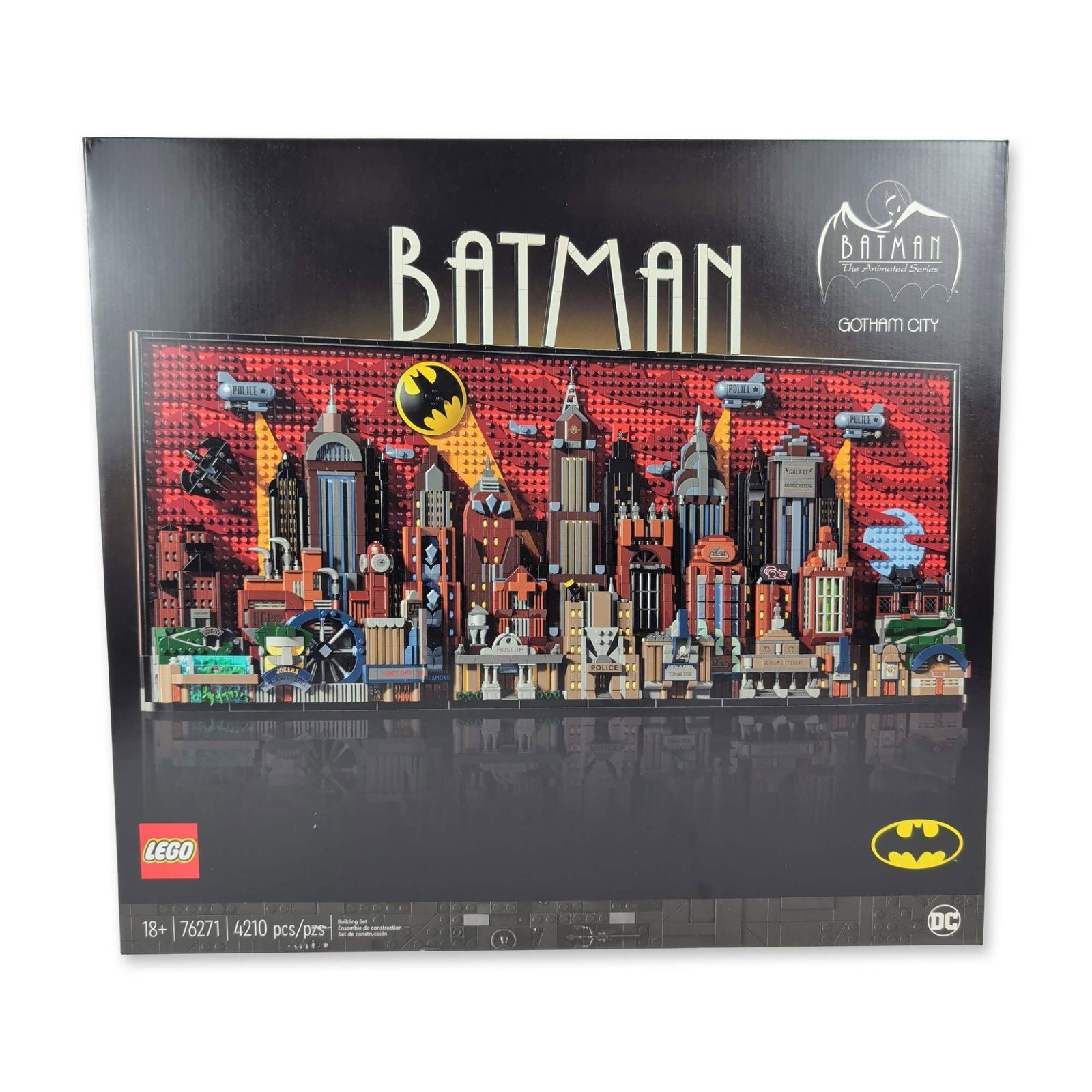 LEGO Batman Gotham City Building Set 76271: LEGO Group (Danish, 2024). Batman Gotham City construction set in plastic, featuring a 3D skyline model based on the animated series with removable panels revealing interior locations. The set include