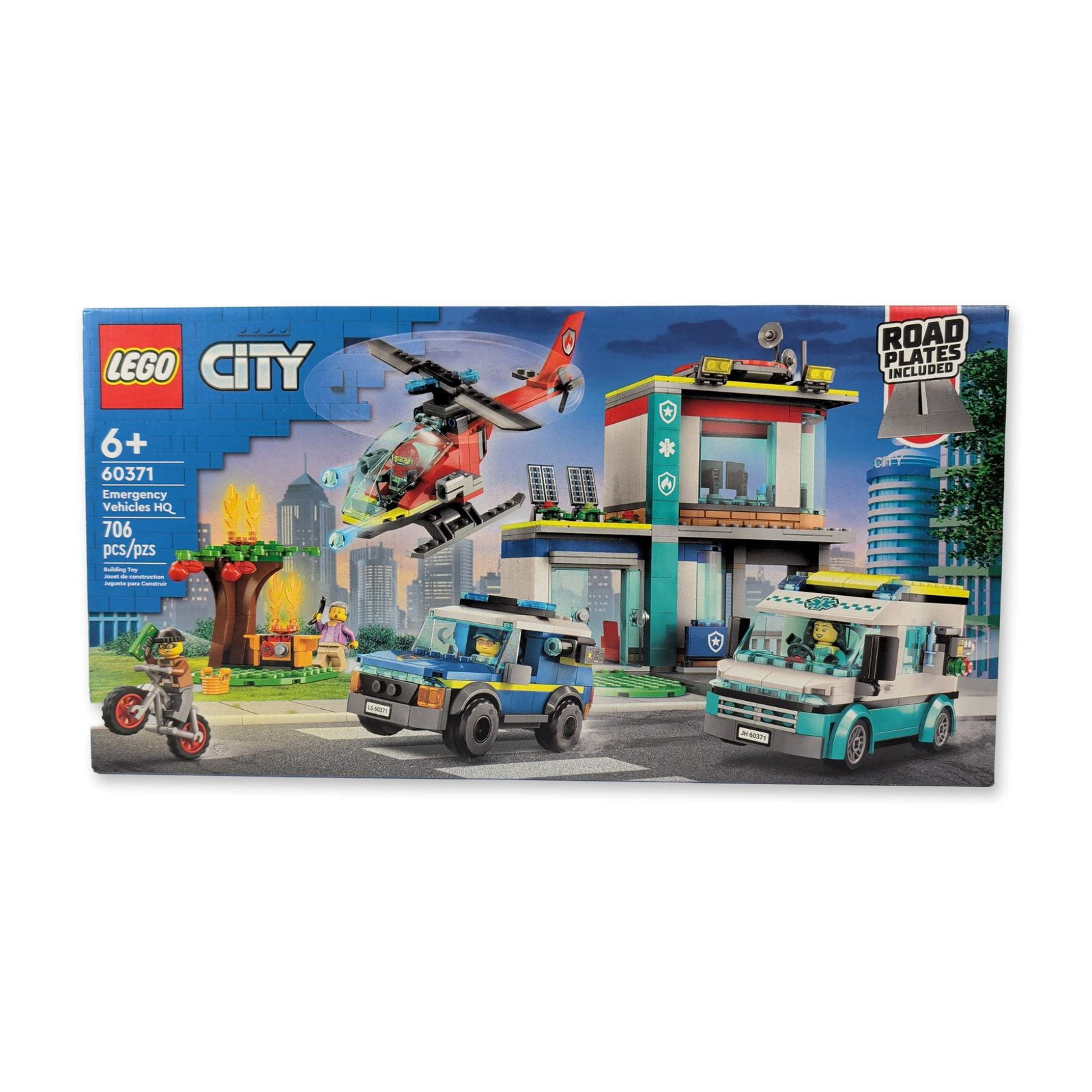 LEGO City 60371 Emergency Vehicles HQ Building Set: The LEGO City Emergency Vehicles HQ set (model 60371) is a fun, molded plastic kit from The LEGO Group featuring a multi-level headquarters with integrated road plates. It comes with a police SUV, an