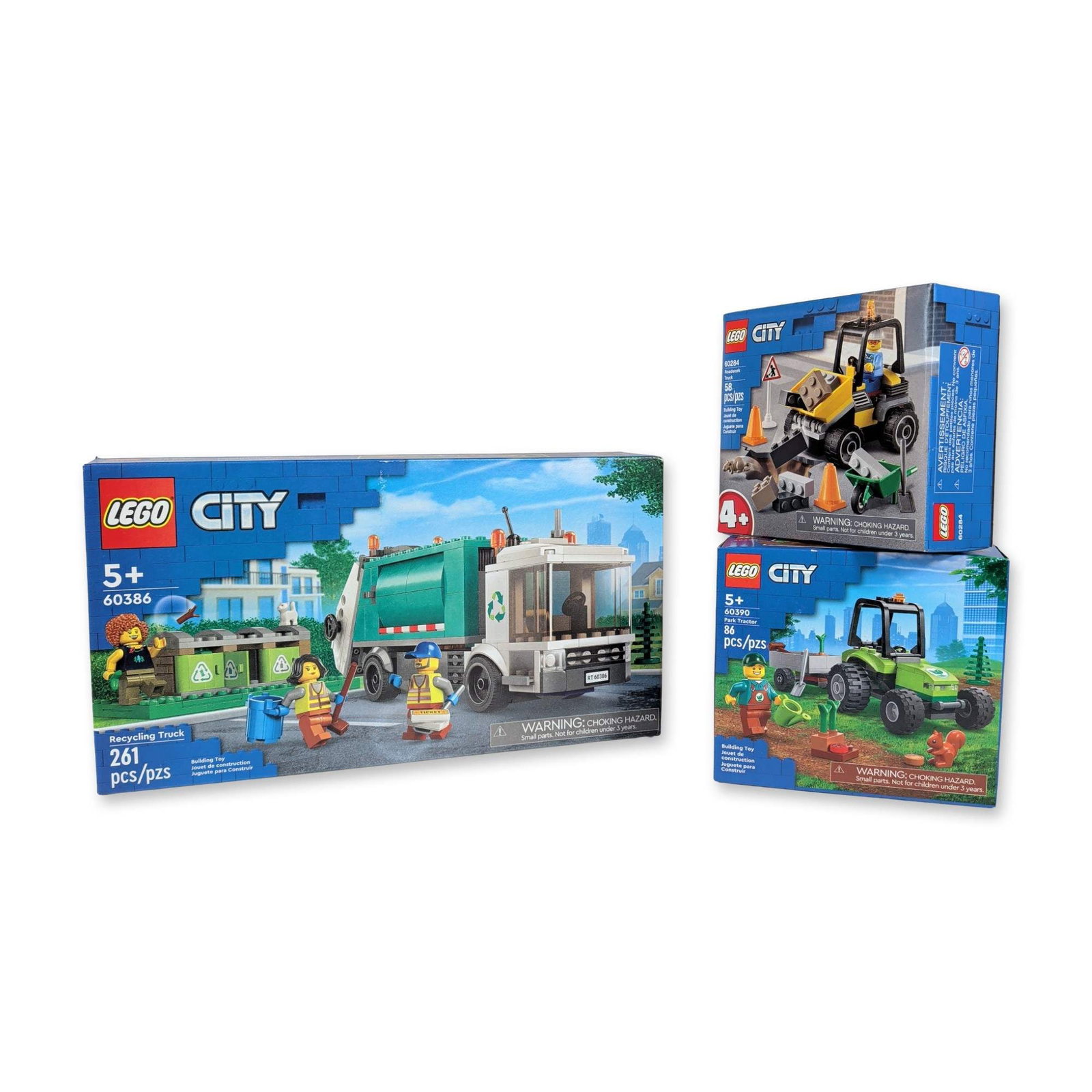 Three LEGO City Building Sets - Roadwork & Recycling Truck plus Park Tractor: LEGO. Three building toy sets in plastic from the LEGO City line, each factory-sealed in its original retail packaging. The collection includes set 60386 Recycling Truck with 261 pieces, featuring a