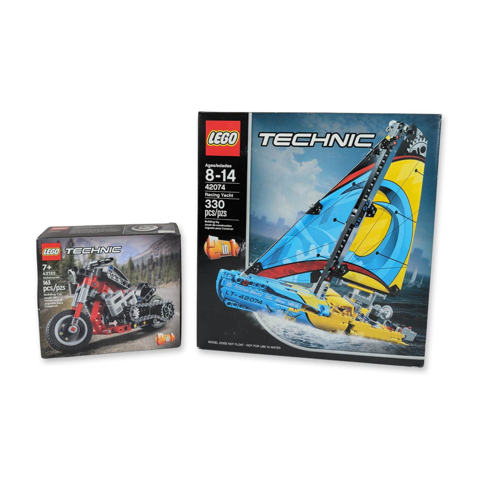 2 LEGO Technic Construction Sets: LEGO. Pair of Technic series construction sets in molded plastic, featuring set 42074 Racing Yacht and set 42132 Motorcycle. Both items are 2-in-1 models designed with functional mechanical components