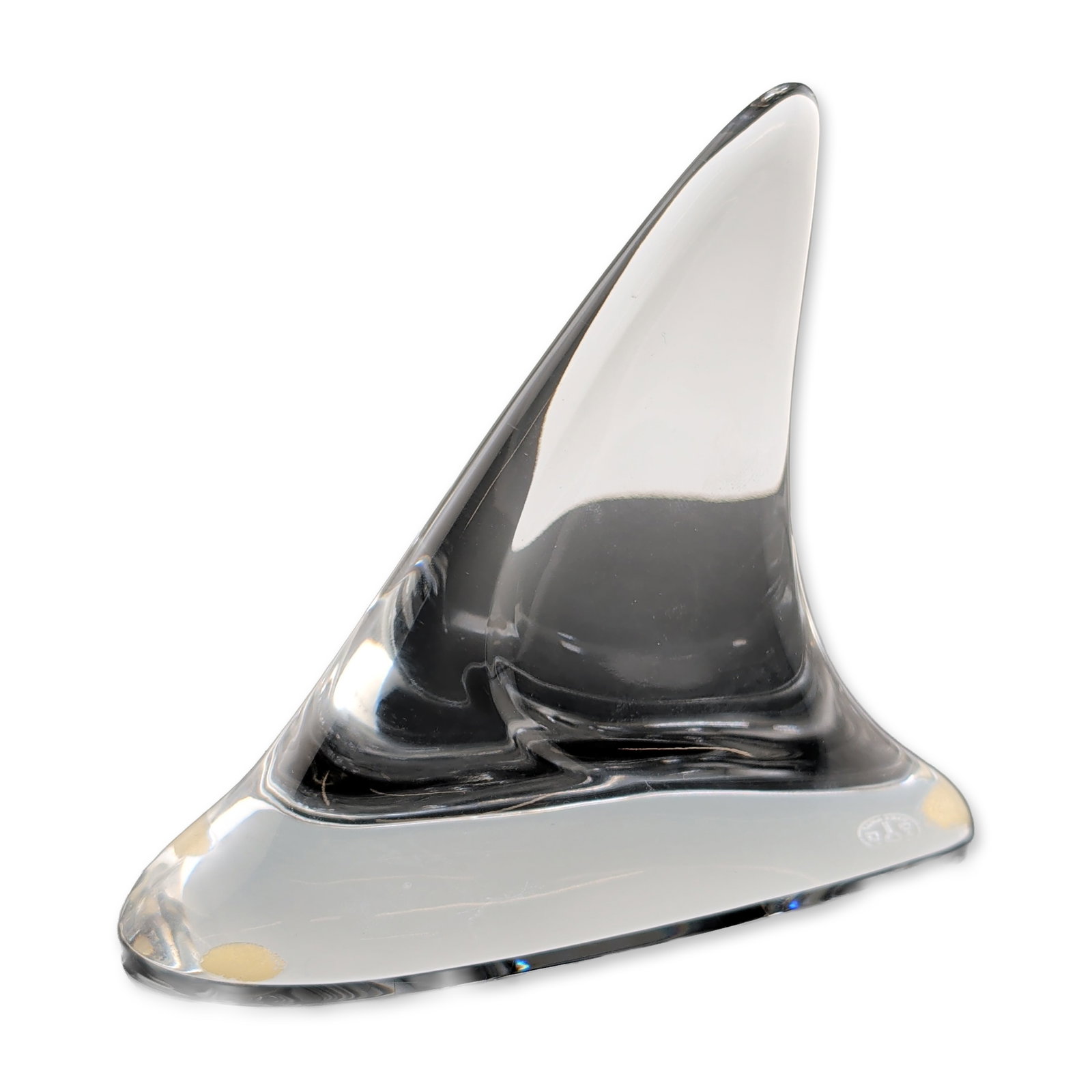 Baccarat France Modernist Clear Crystal Shark Fin Paperweight: Abstract modernist sculpture in solid clear lead crystal, featuring a fin form tapering to a point ending in a narrow-polished base. Underside features an acid-etched circular factory mark with the Ba