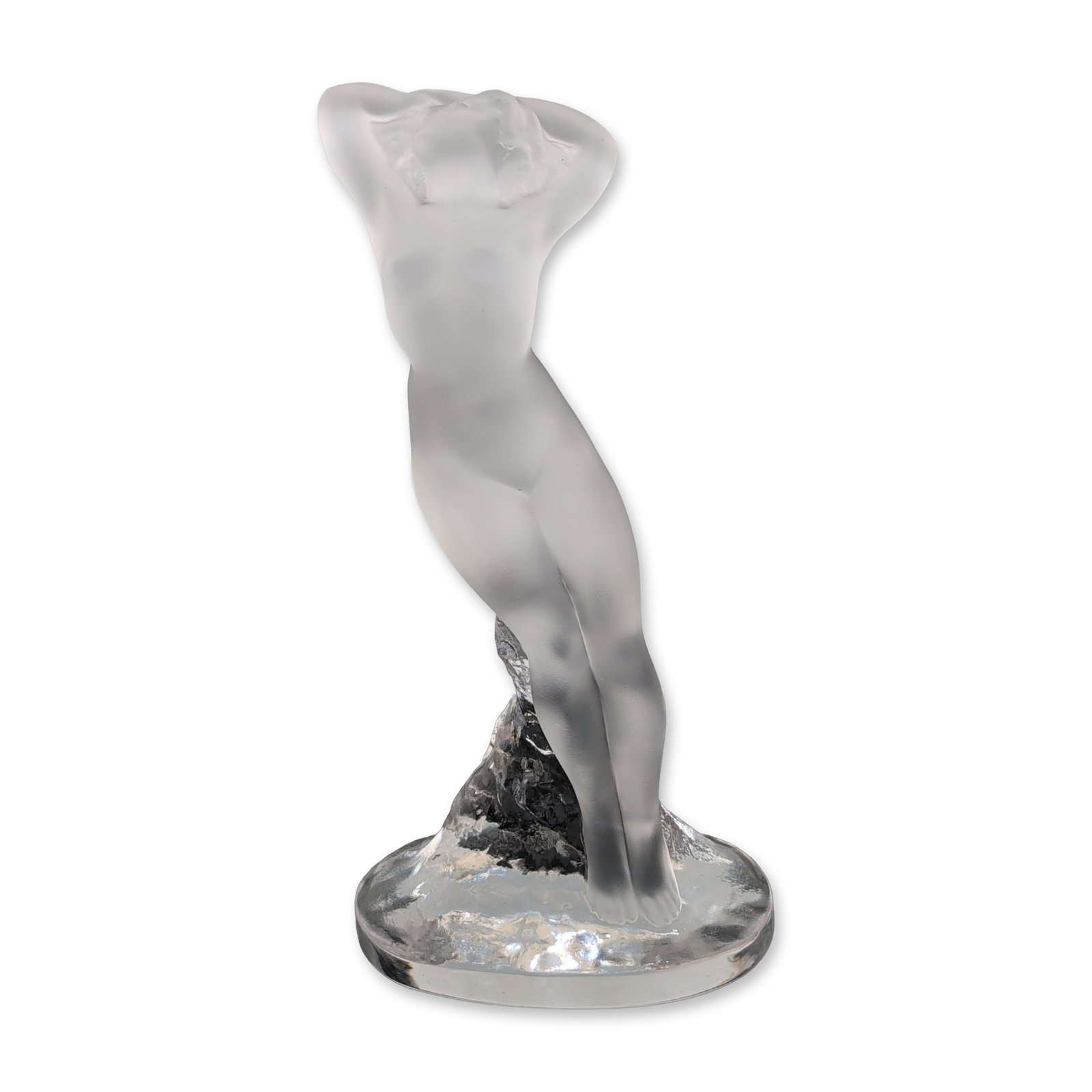 Lalique Clear and Frosted Crystal Figure, Nude Dancer: Lalique France. Dancer statuette is designed in frosted and polished lead crystal, depicting a standing nude female figure in an arched pose with arms raised behind her head. Based on the 1931 car mas