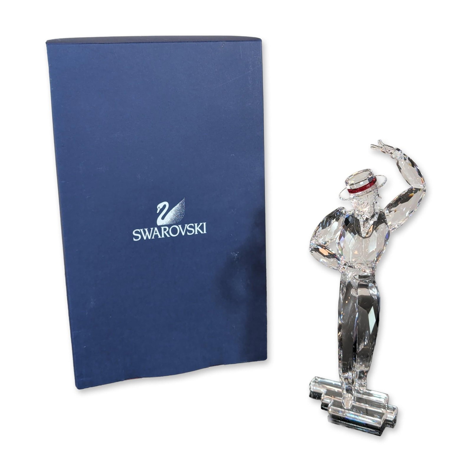 Swarovski Antonio The Magic of Dance Collection Crystal Figurine with COA: Swarovski Antonio figurine from the Magic of Dance collection, designed by Martin Zendron, and featuring multifaceted lead crystal, and red crystal accents on the top hat. The base is marked with the 