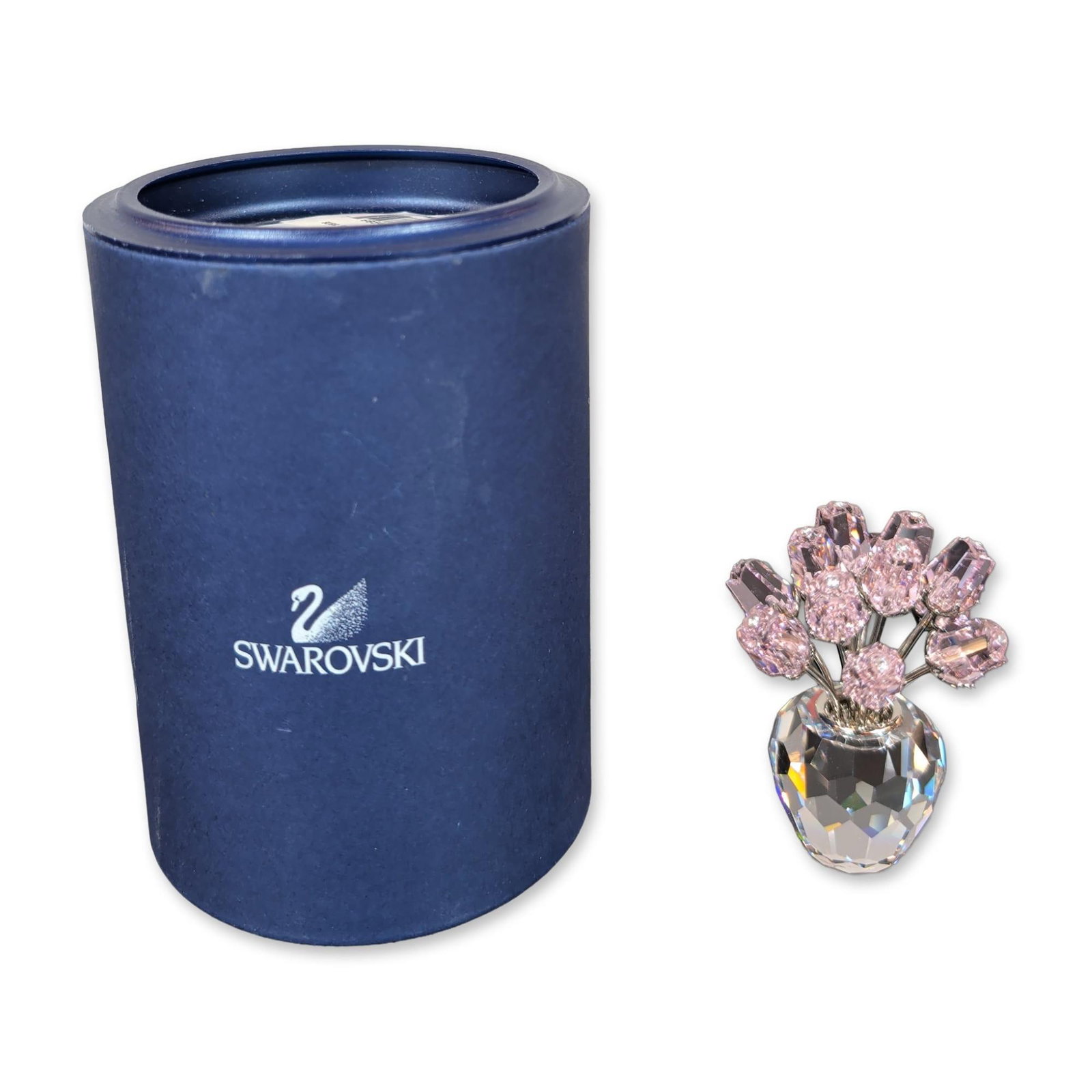 Swarovski Crystal A Dozen Pink Roses Figurine: Miniature figurine in faceted lead crystal and silver-tone metal, featuring a bouquet of seven pink crystal flower heads mounted on individual metal stems set into a clear faceted crystal vase base. F