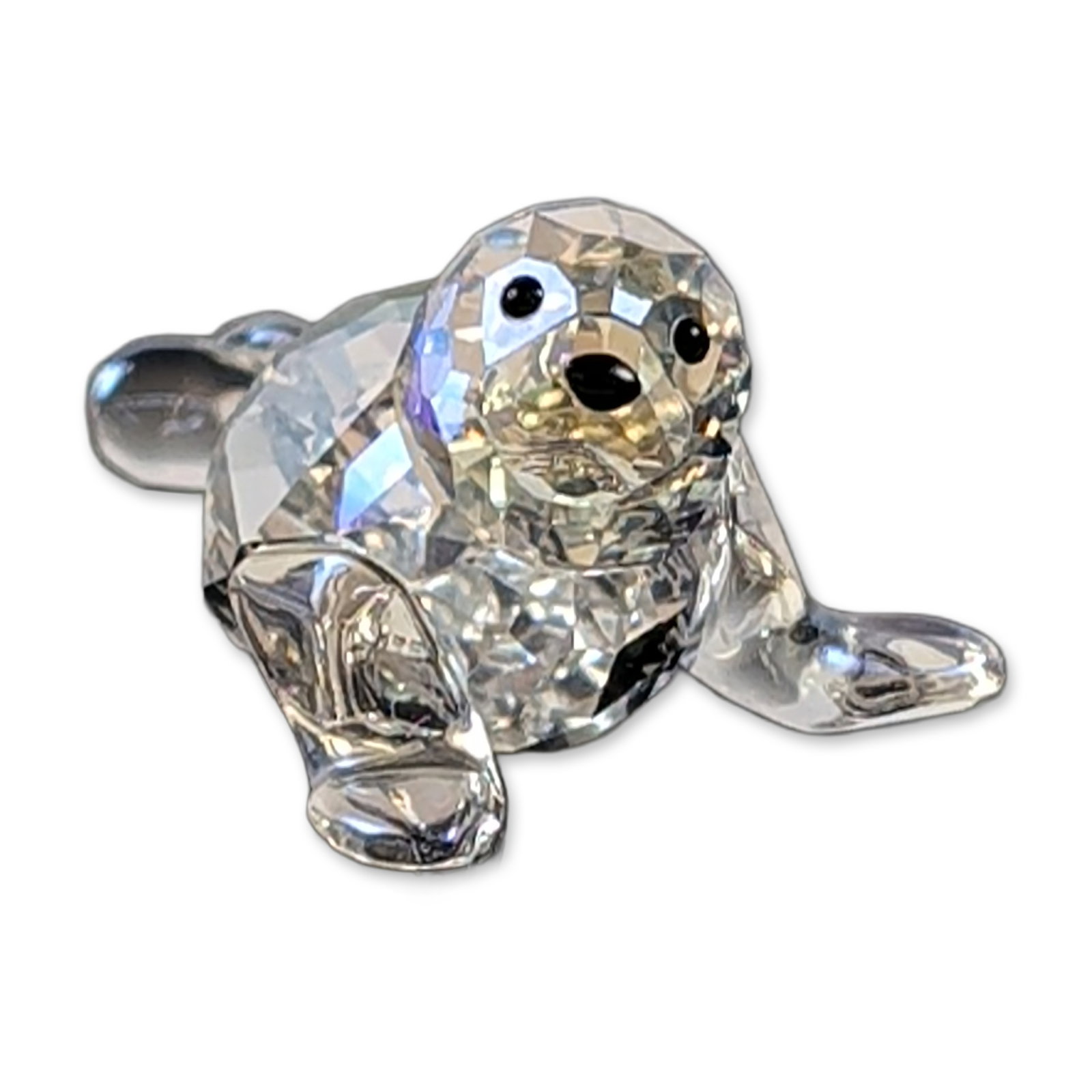 Swarovski Crystal Baby Seal Figurine: A Swarovski Crystal Society (SCS) 2012 Event Exclusive "Baby Seal" figurine, model number 1096748. Designed by Stefanie Nederegger to complement the "Paikea" Annual Edition collection. The figure is e