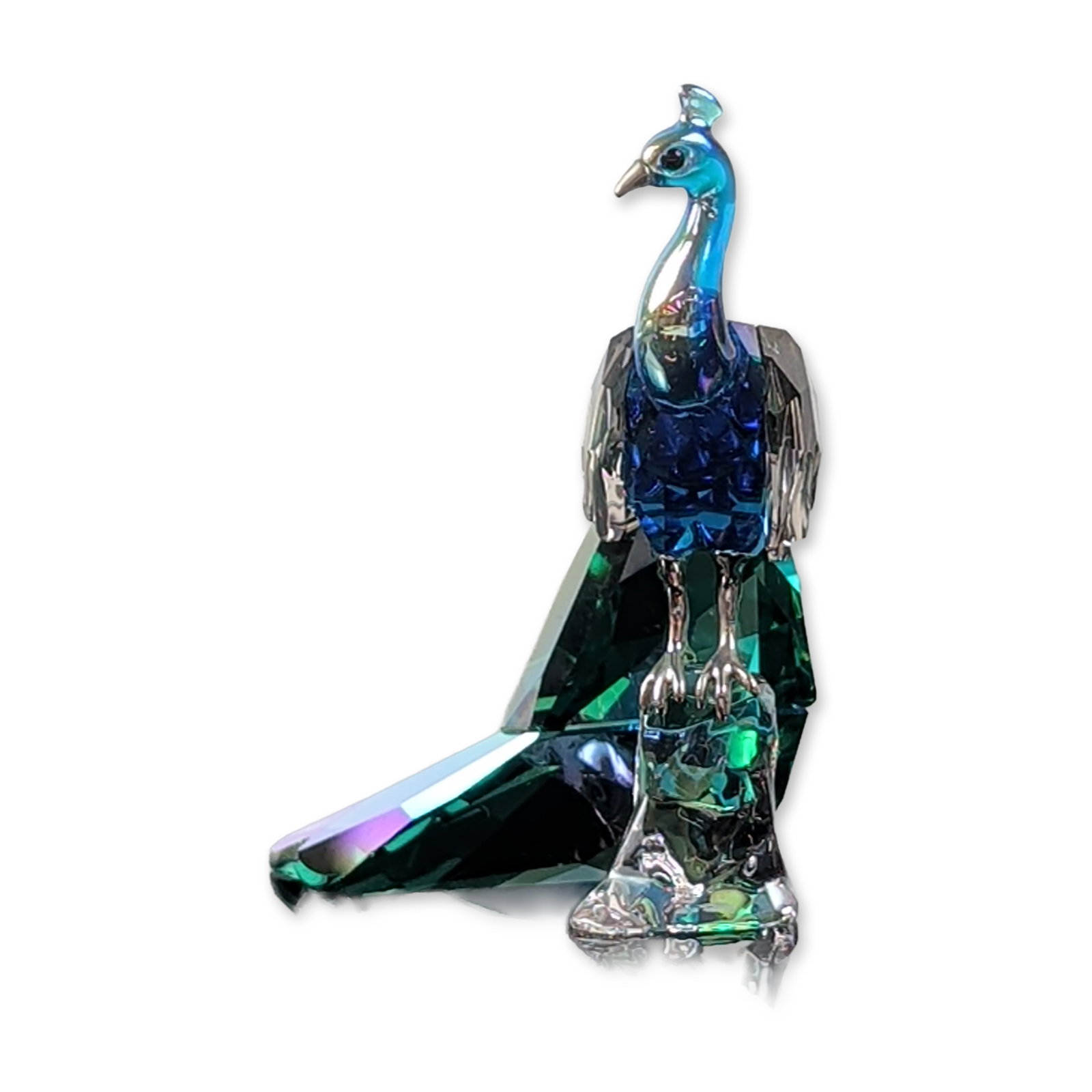 Swarovski SCS 2011 Crystal Peacock Figurine: The 2011 Swarovski Crystal Society loyalty gift is a stunning peacock figurine crafted from faceted lead crystal, showcasing a deep blue head and body with a large, shimmering iridescent green tail. S