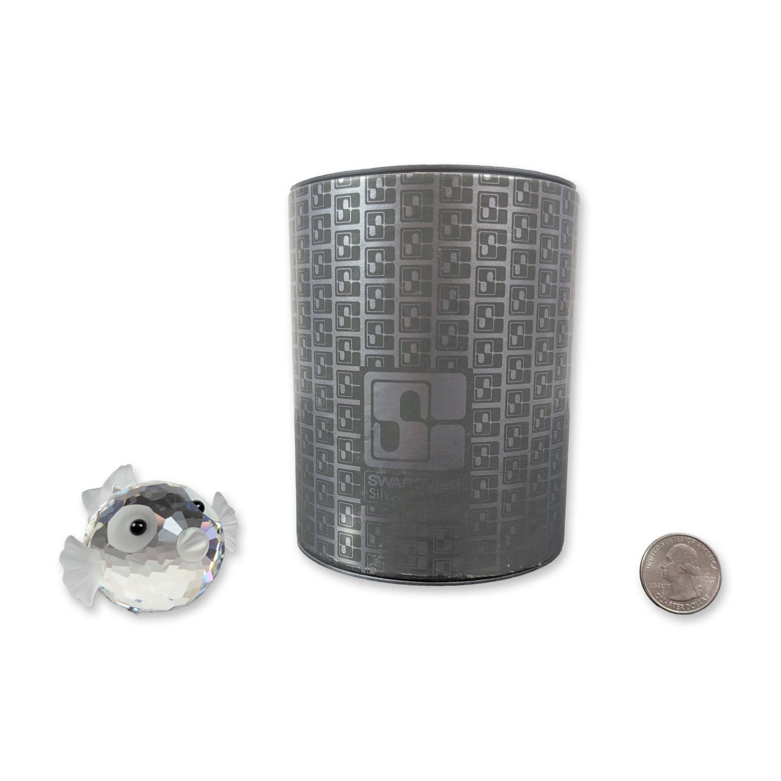 Swarovski Silver Crystal Figurin, Large Blowfish: Swarovski Silver Crystal puffer fish figurine, model 7644 NR 041 000. Lead crystal construction featuring a faceted spherical body with frosted crystal mouth, fins, and tail. Eyes detailed with black 