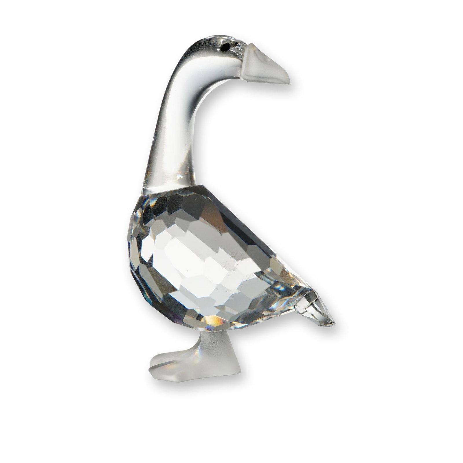 Swarovski Silver Crystal Figurine, Gosling Dick: The figurine features a faceted clear lead crystal body with a smooth neck and head, finished with inset black bead eyes and a frosted crystal bill and webbed feet base. Acid-etched Swarovski swan log