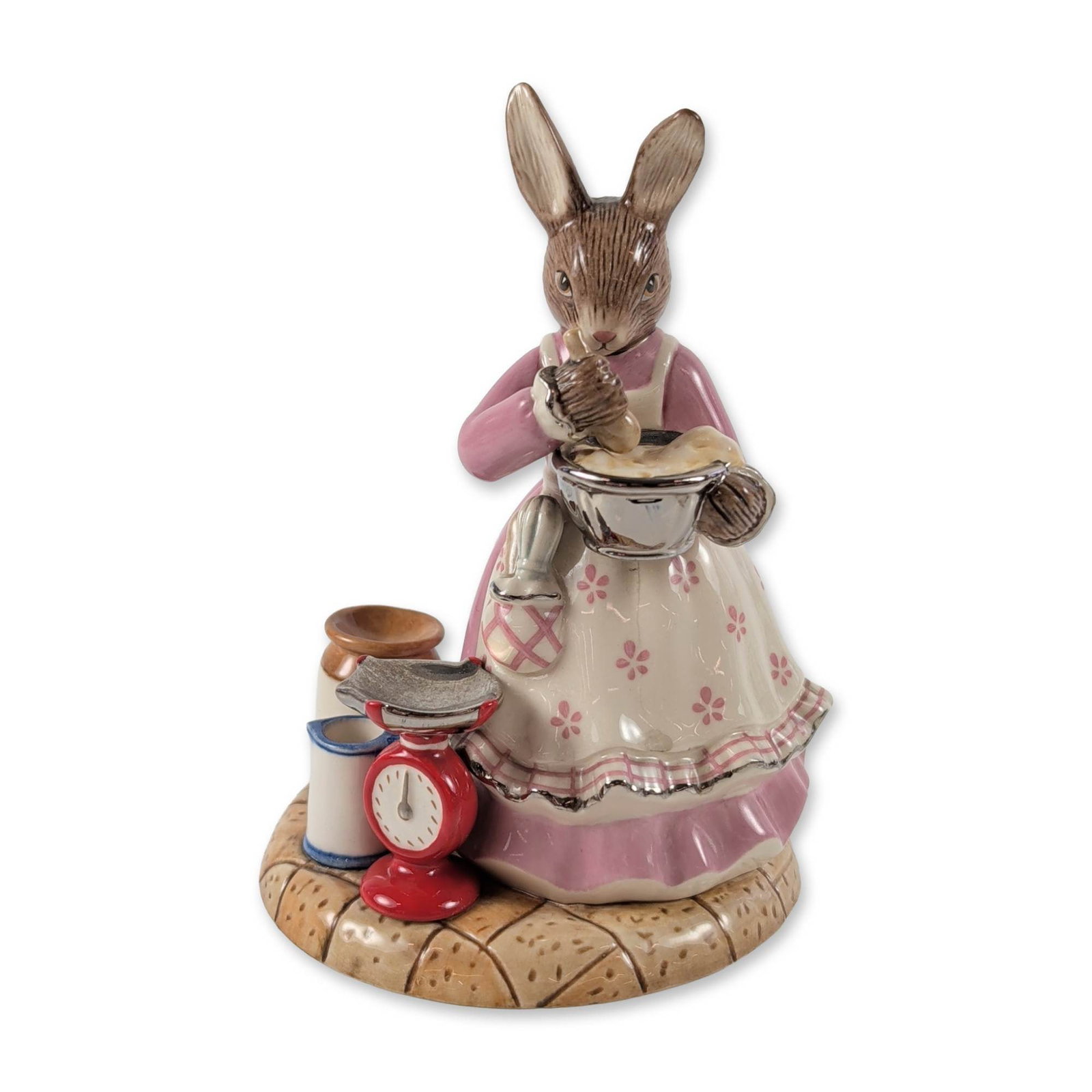 Royal Doulton "Cup Cakes" Bunnykins DB500 Limited Edition w/ Platinum Accents: Royal Doulton hand-decorated earthenware figurine titled Cup Cakes Bunnykins, model DB 500, from the Bunnykins Hobbies series. The figure depicts a mother rabbit character in a pink dress and cream fl