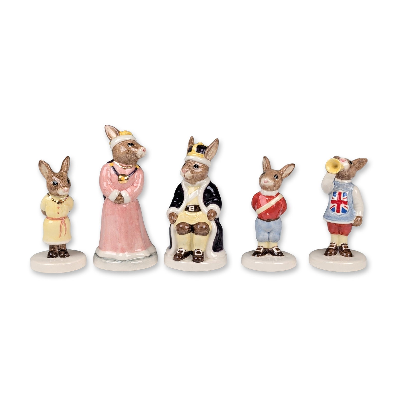 5pc Royal Doulton Bunnykins Royal Family Figurines: Royal Doulton porcelain figurines from the Bunnykins Royal Family series, dated 1990. The group consists of five hand-painted characters. Each piece is finished with a high-gloss glaze and bears the c