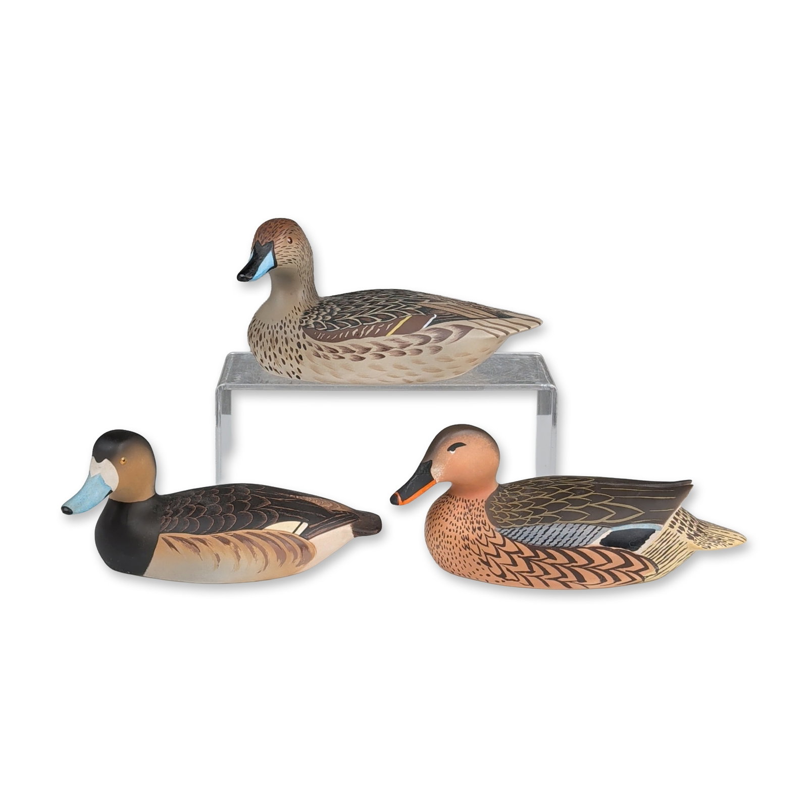 3pc Royal Doulton Lem Ward Wildfowl Counterfeit Ducks: Royal Doulton, England. Trio of porcelain duck figurines from the A Wildfowl Counterfeit series, designed after the wood carvings of Lemuel Lem Ward. The collection includes a Mallard Female (HN 3515)