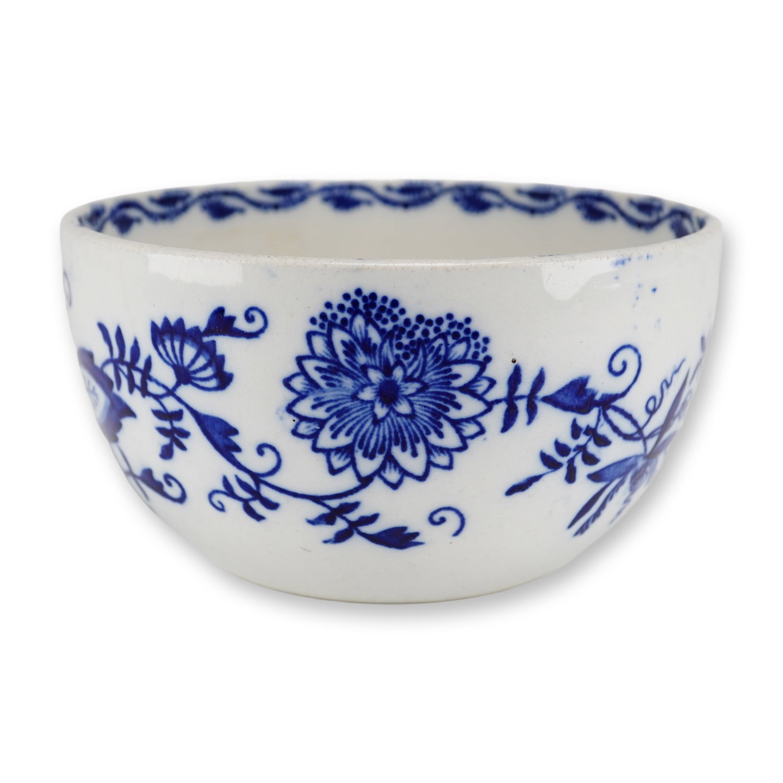 Wedgwood Etruria Blue Onion Pattern Transferware Bowl: This deep circular bowl is made of earthenware and features the Blue Onion pattern. The decoration is applied via blue transfer-printing and includes stylized floral and foliate motifs such as peonies