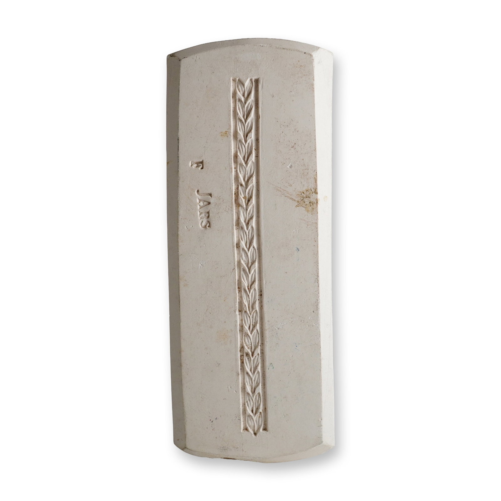 Wedgwood Plaster Foliate Pattern Sprig Mold: This item is a Wedgwood plaster sprig mold used in the production of relief-decorated ceramics such as Jasperware. The tool is a rectangular block with a slightly curved upper surface containing an in