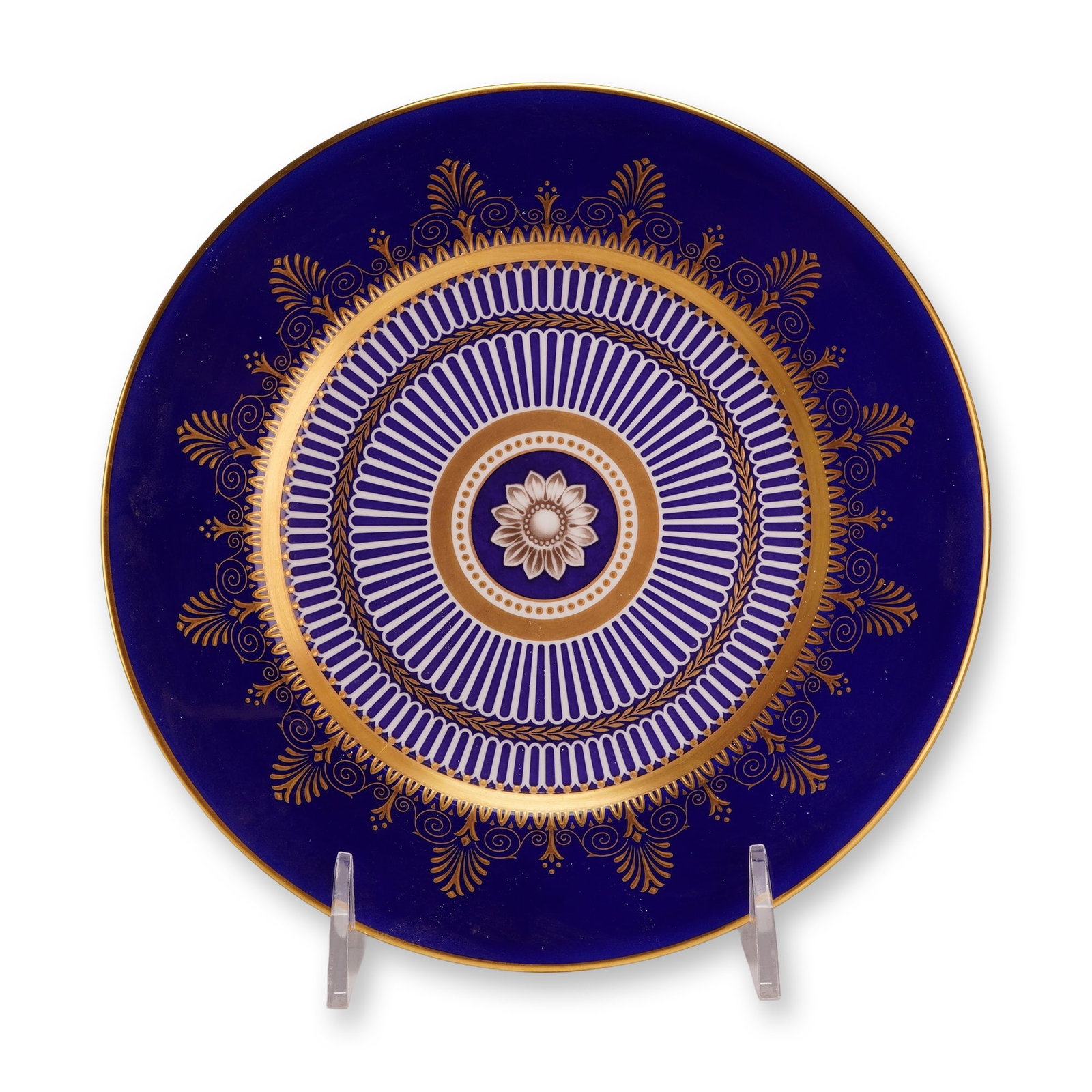 Wedgwood Anthemion Blue Bone China Plate: This bone china plate is manufactured by Wedgwood in the Anthemion Blue pattern. The design features a wide cobalt blue border decorated with a gilded neoclassical frieze of anthemion and palmette mot