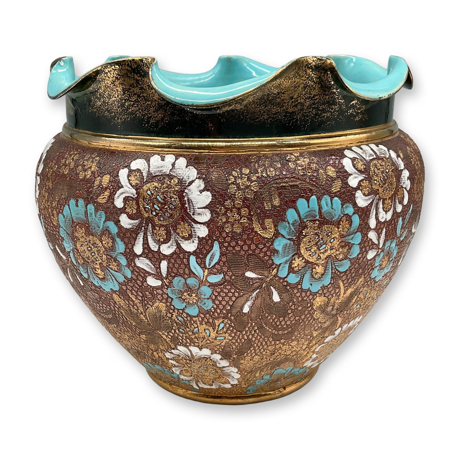 Doulton & Slaters Floral Jardiniere with Gilded Accents: A stunning Doulton & Slaters jardiniere showcasing intricate craftsmanship with a textured floral design. This decorative piece features a combination of embossed flowers in white and turquoise with g