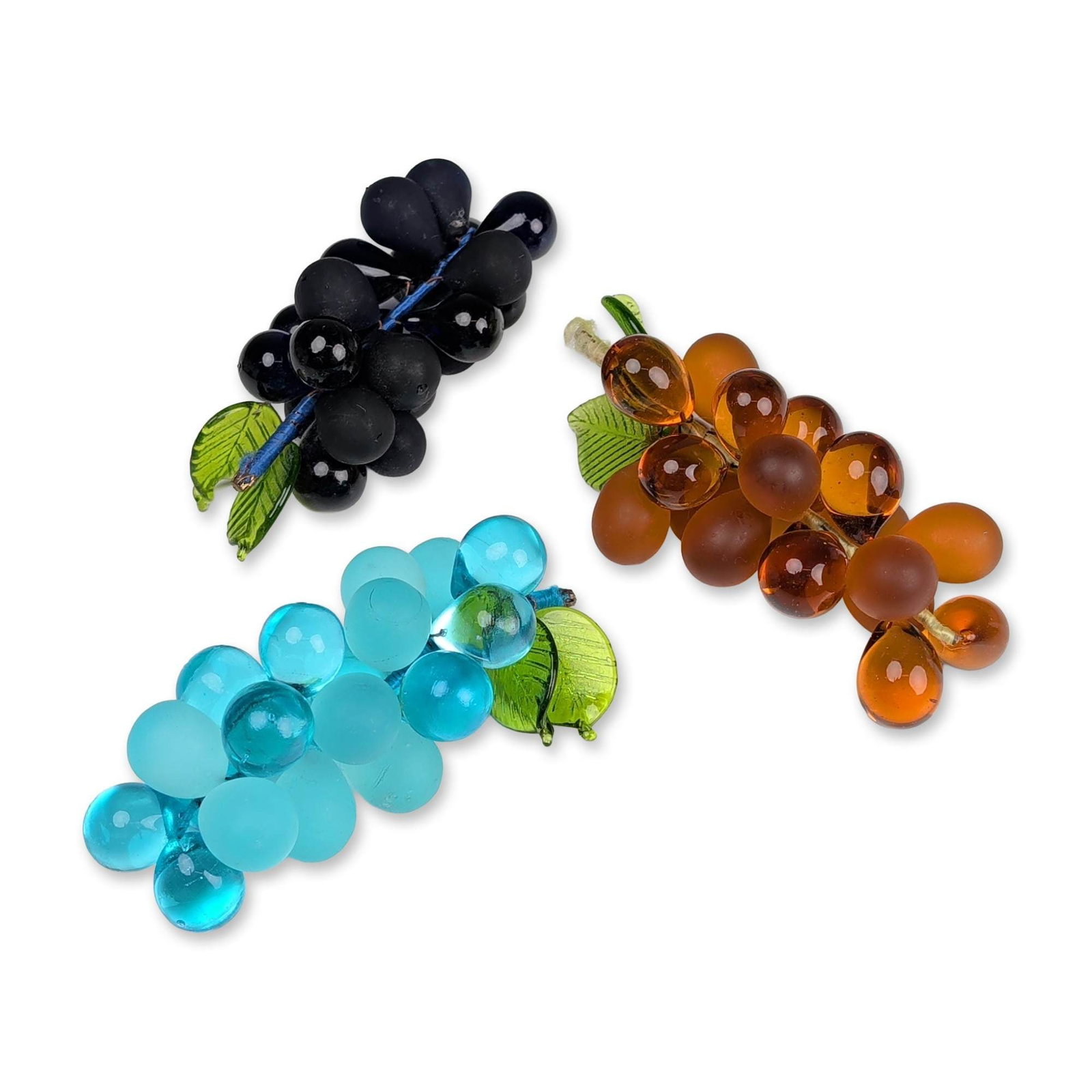 3pc Art Glass Grape Clusters: Decorative grape clusters in hand-formed art glass, featuring amber, blue, and dark purple color. Each cluster is composed of a mixture of translucent and frosted matte finish glass grapes attached