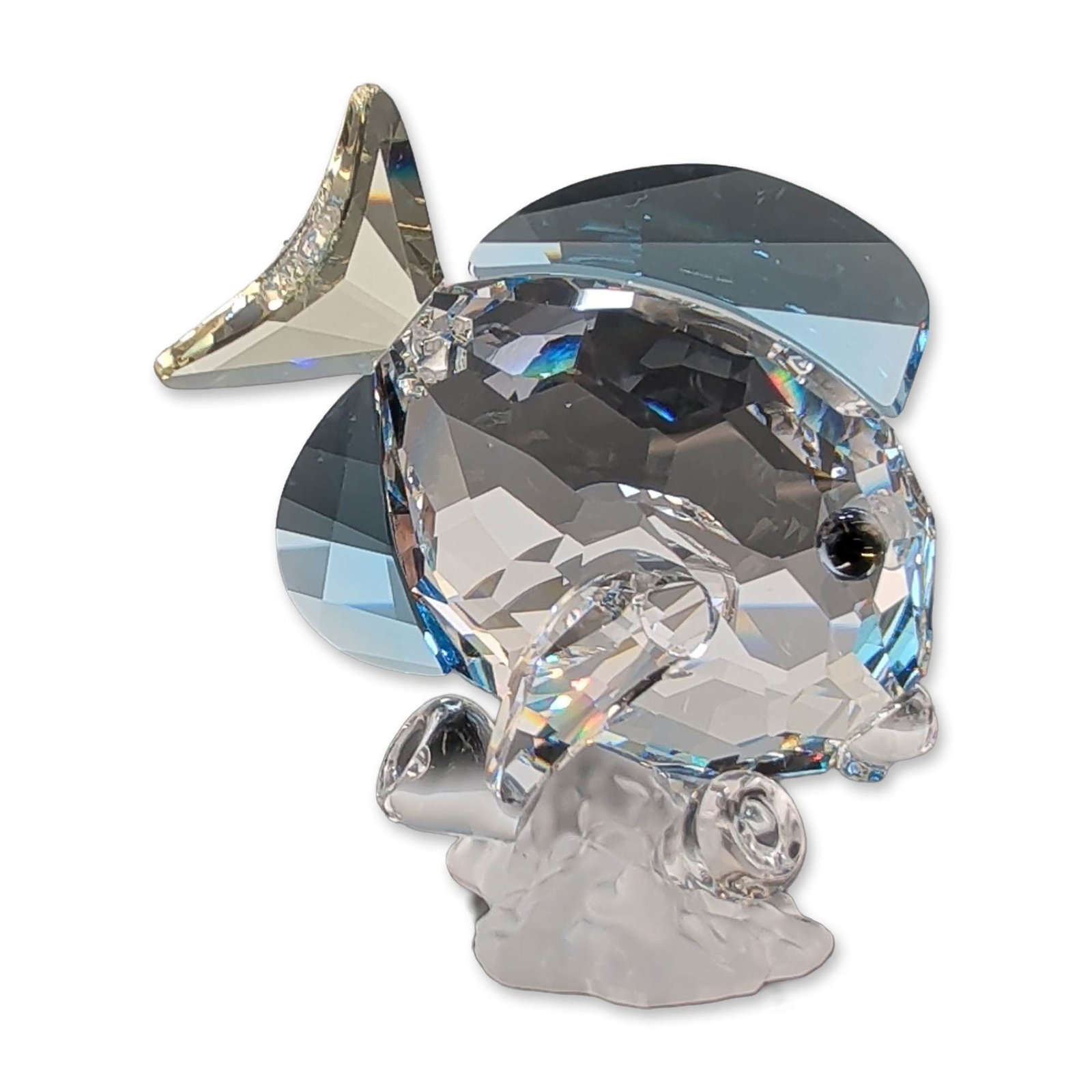 Swarovski Austrian Crystal Blue Tang Figurine: Swarovski crystal figurine of a Blue Tang fish, manufactured in Austria as an exclusive gift for Swarovski Crystal Society members. Released in 2007 as part of the Wonders of the Sea trilogy, the piec