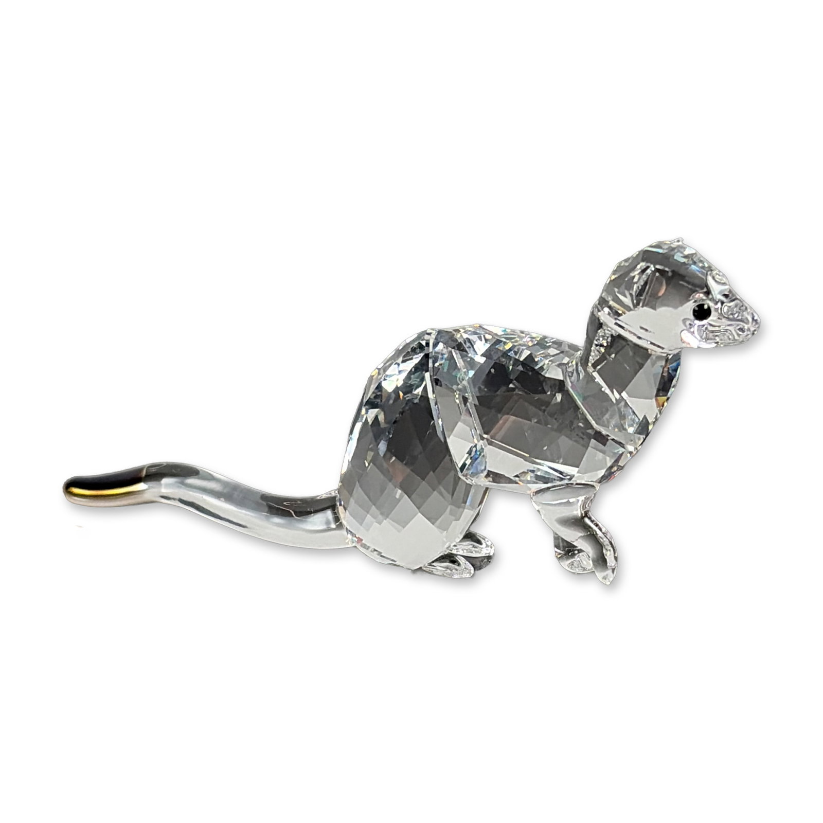 Swarovski SCS 2019 Event Piece Crystal Ermine: Swarovski Crystal Society event piece from 2019 depicting an ermine. The figurine is constructed from faceted clear lead crystal with black crystal accents for the eyes and a black-coated tip on the t