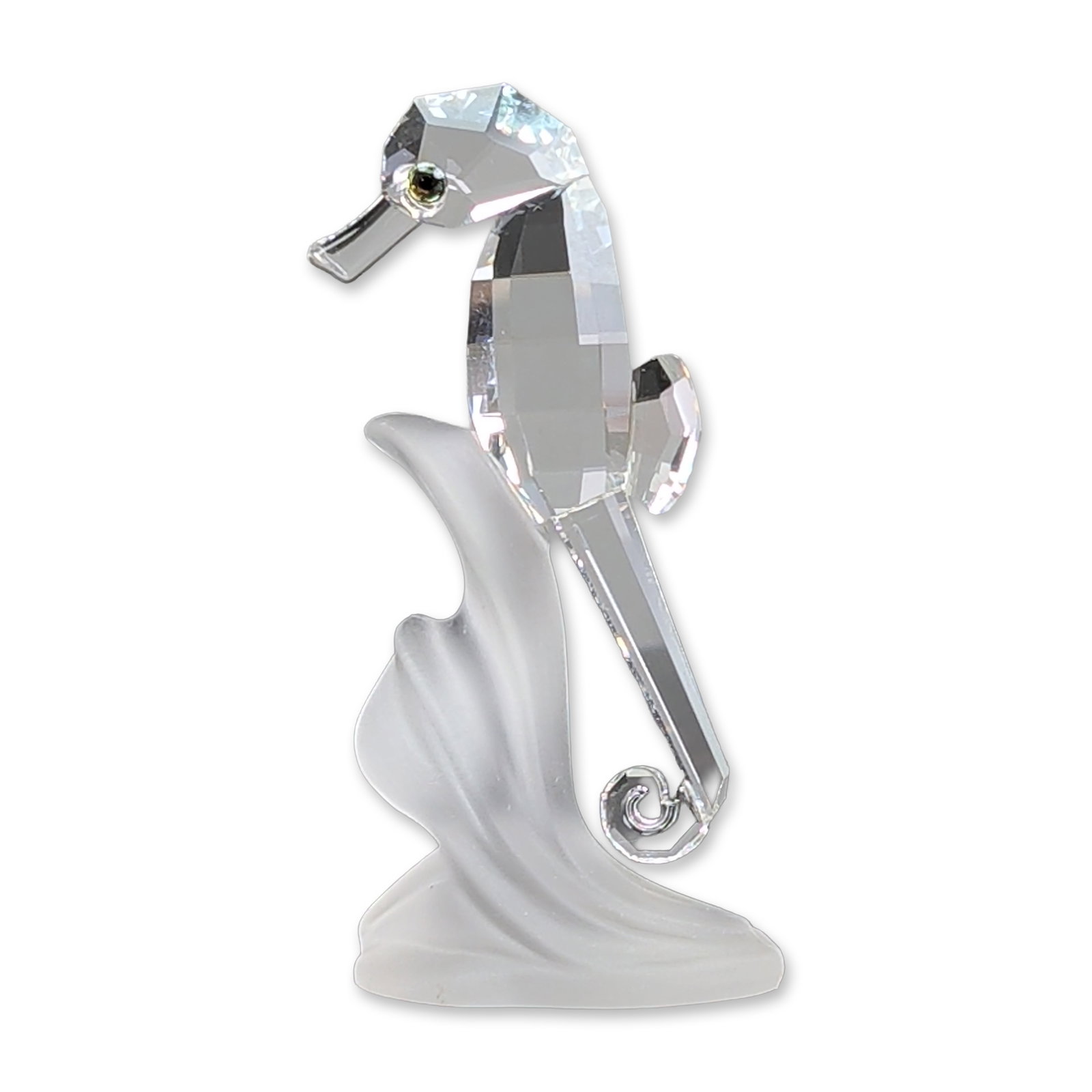 Swarovski Silver Crystal Figurine, Seahorse on Frosted Base: Swarovski Silver Crystal figurine, Aquatic Worlds collection, designed by Michael Stamey. The piece features a faceted clear lead crystal seahorse in a horizontal swimming posture with inset dark crys
