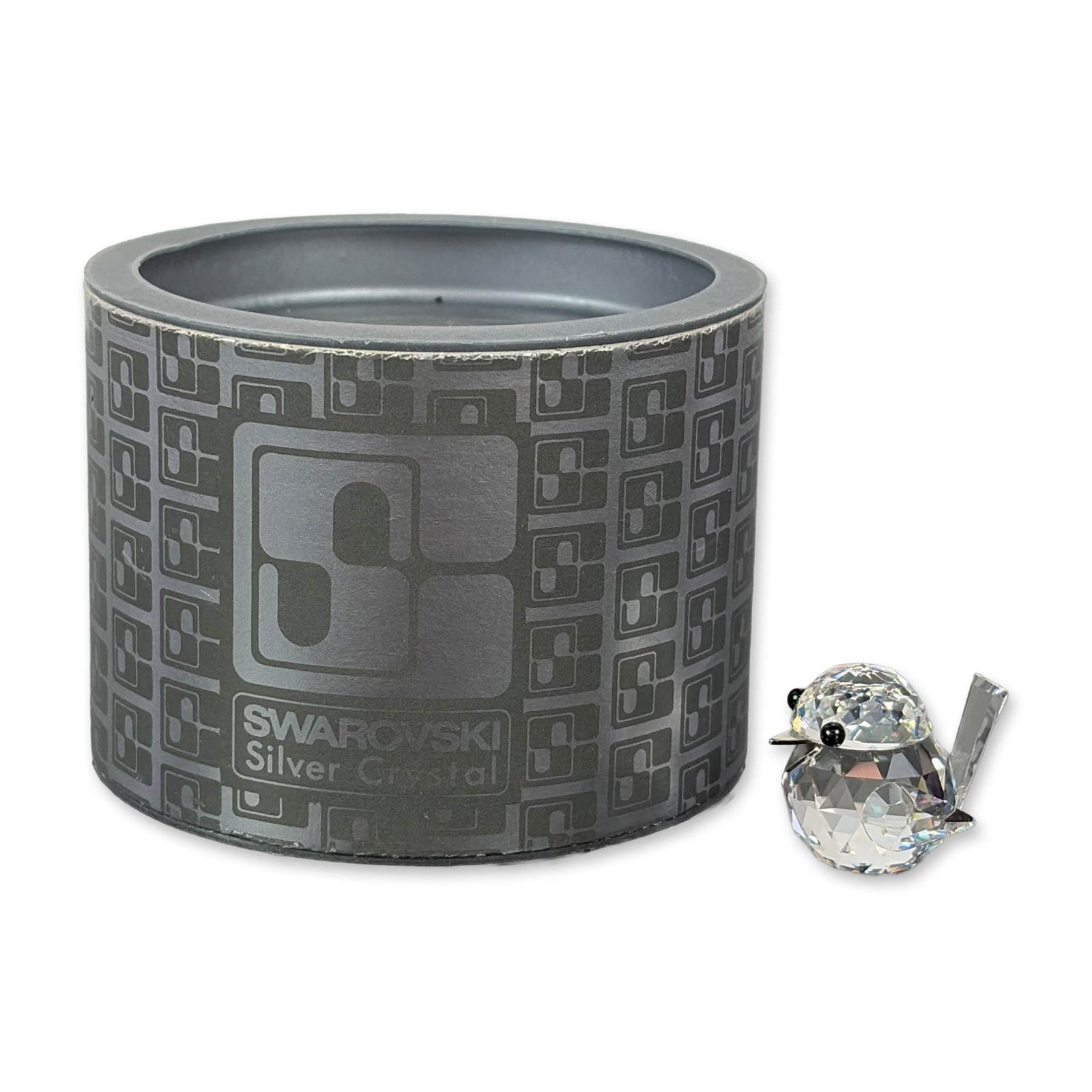 Swarovski Silver Crystal Lead Crystal Mini Sparrow Figurine: Swarovski (Austria, late 20th century). A faceted lead crystal figurine of a mini sparrow, featuring a silver-toned metal beak and black bead eyes. The piece is constructed with a multi-faceted spheri