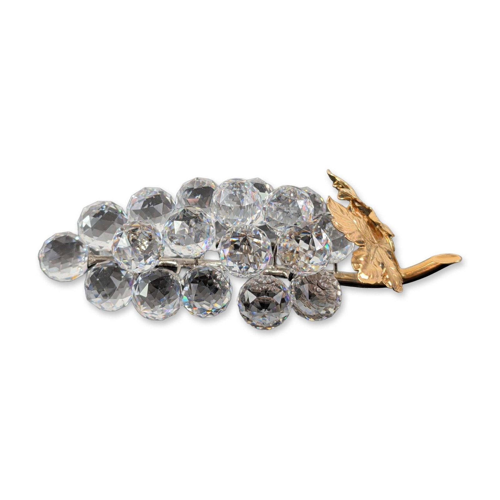 Swarovski Crystal and Two-Tone Metal Grape Brooch: Swarovski Silver Crystal collection brooch designed as a botanical grape cluster. The piece features seventeen faceted clear round crystals representing grapes, secured by a silver-toned metal framewo
