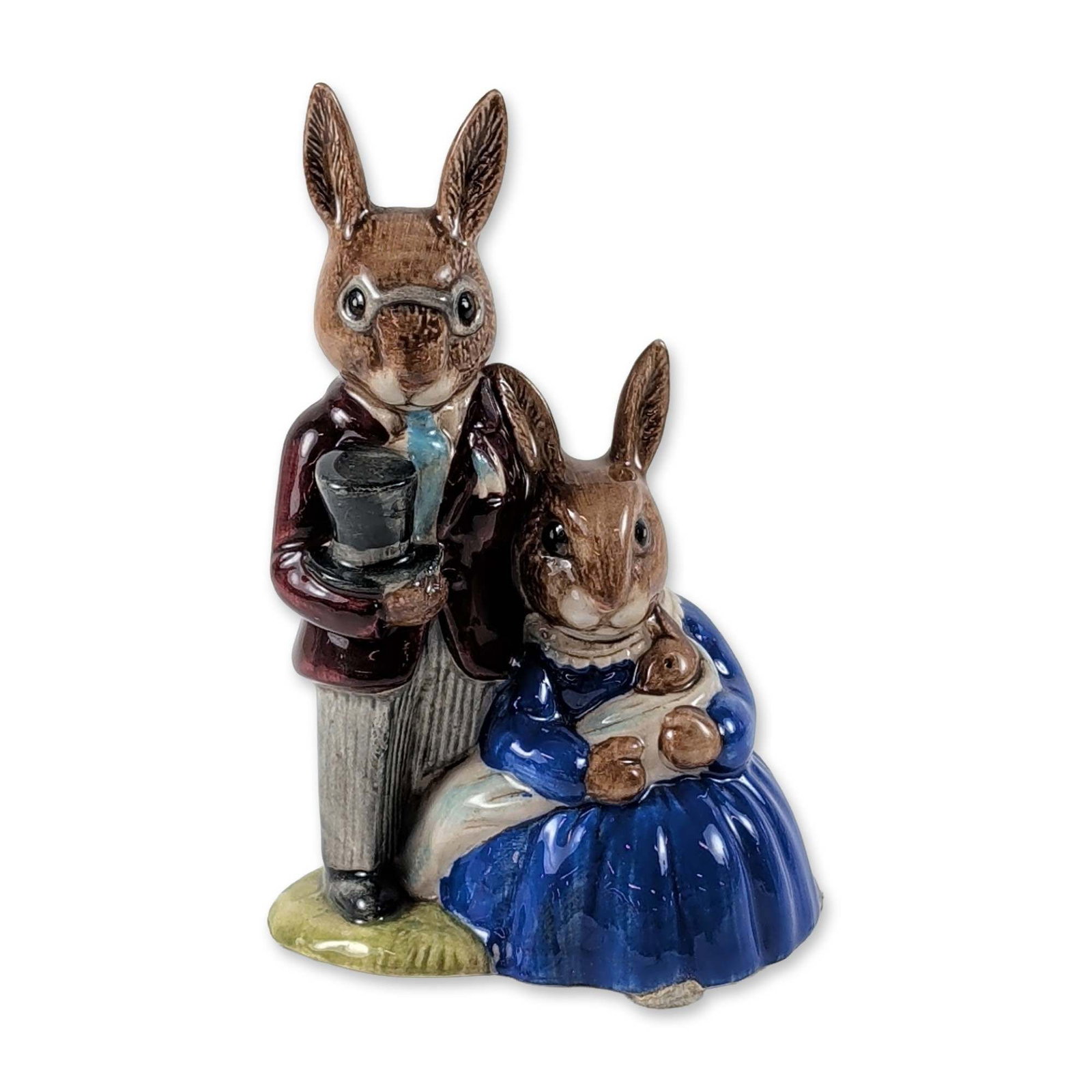 Royal Doulton Bunnykins Family Photograph Figurine DB1: Royal Doulton glazed porcelain figurine titled Family Photograph, model DB1, from the Bunnykins series. The piece depicts an anthropomorphic rabbit family posing for a portrait, featuring a mother in 