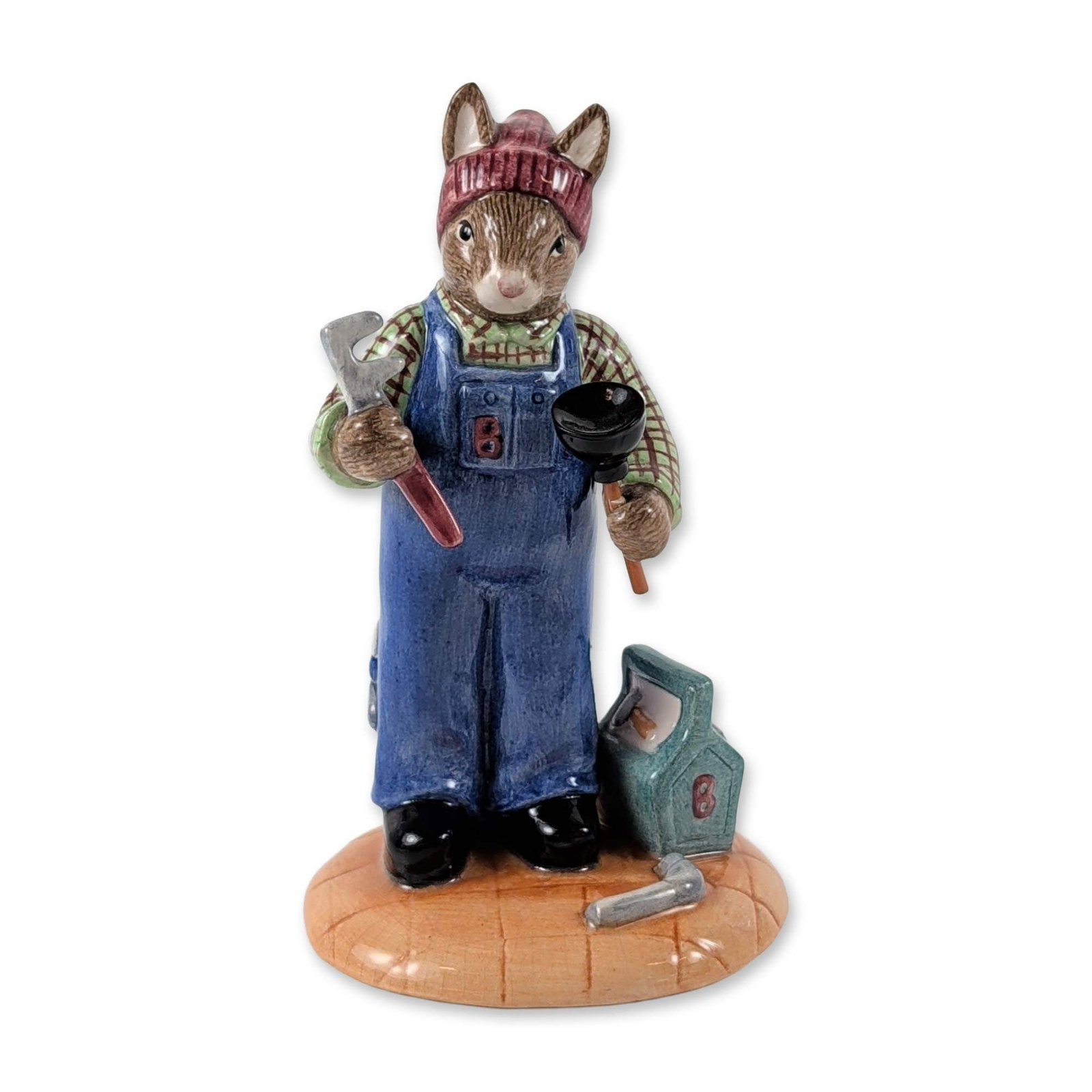 Royal Doulton Bunnykins Plumber Figurine DB378: Royal Doulton porcelain figurine titled Plumber, model DB 378, from the Bunnykins Professions Collection. Hand-decorated polychrome porcelain figure depicting an anthropomorphic rabbit in a green plai