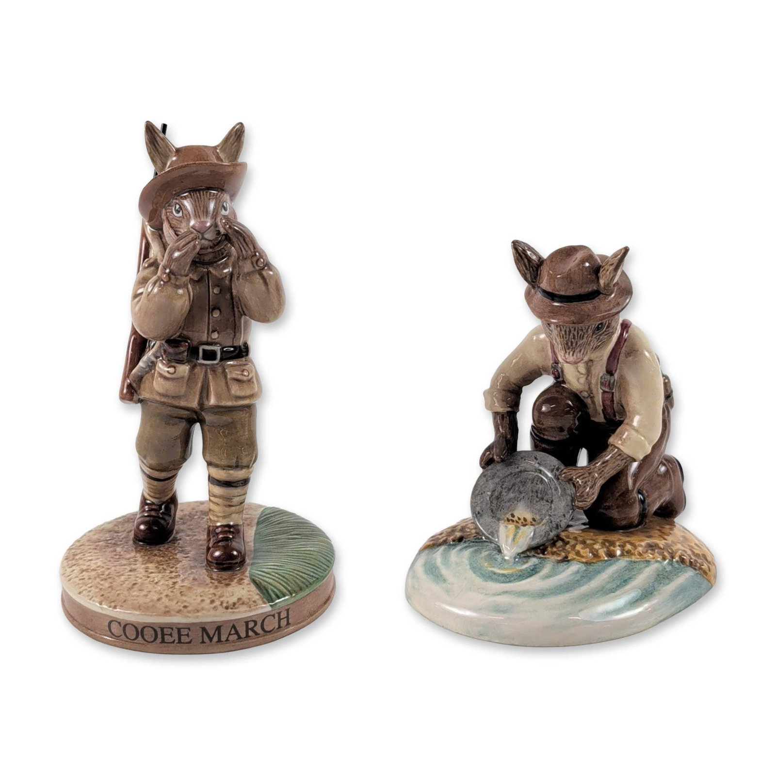 2pc Royal Doulton Australian Bunnykins Figurines: Royal Doulton. Hand-decorated glazed earthenware Bunnykins figurines with Australian historical themes. The Eureka Bunnykins (DB 434) figure depicts an anthropomorphic rabbit gold prospector kneeling 