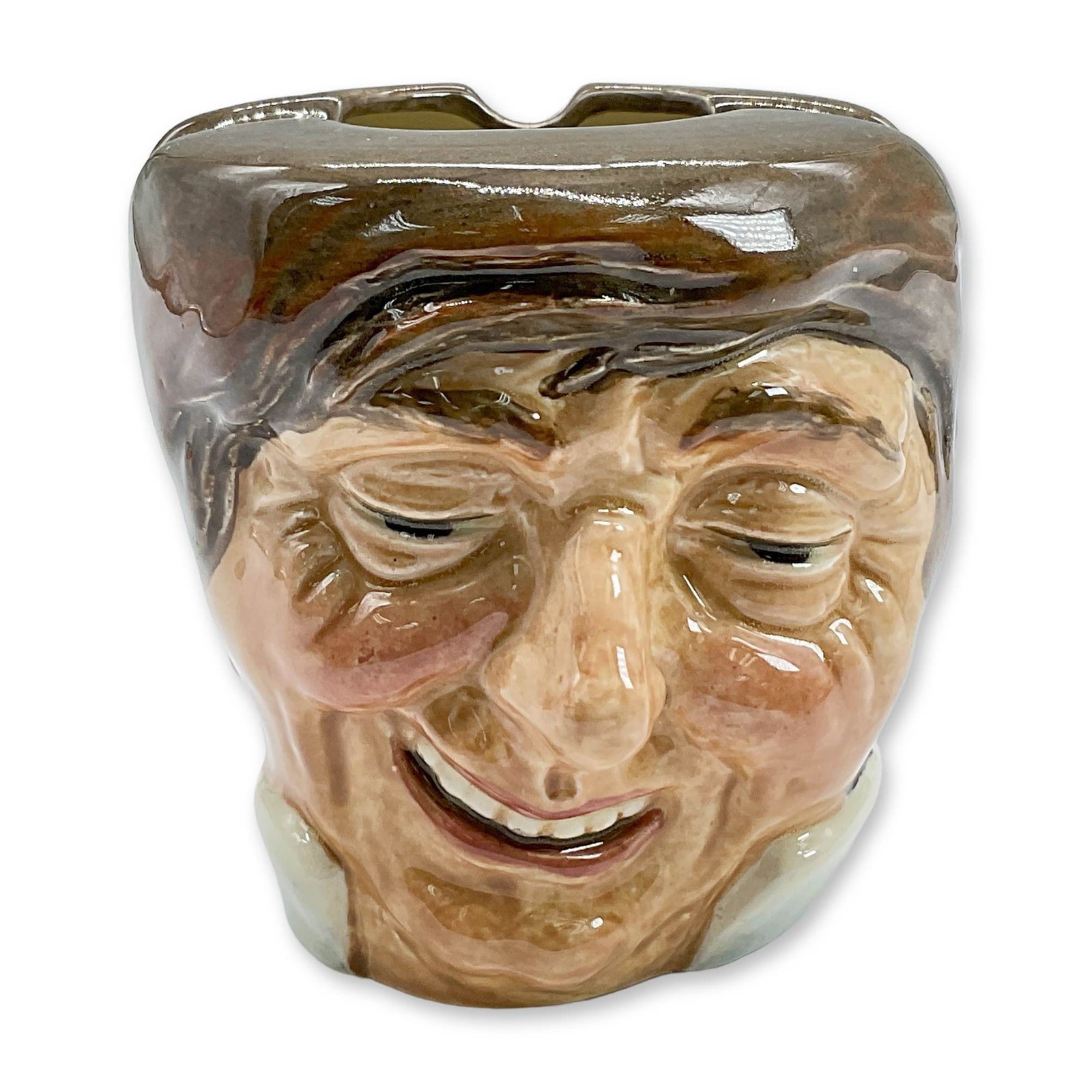 Farmer John D6007 - Royal Doulton Ash Bowl: Dark green coat trimmed with yellow; white shirt; beige trousers; red sash; black hat and boots. Royal Doulton backstamp. Artist: Charles J. Noke Dimensions: 3"H Date or Era: 1939 - 1960 Manufacturer 