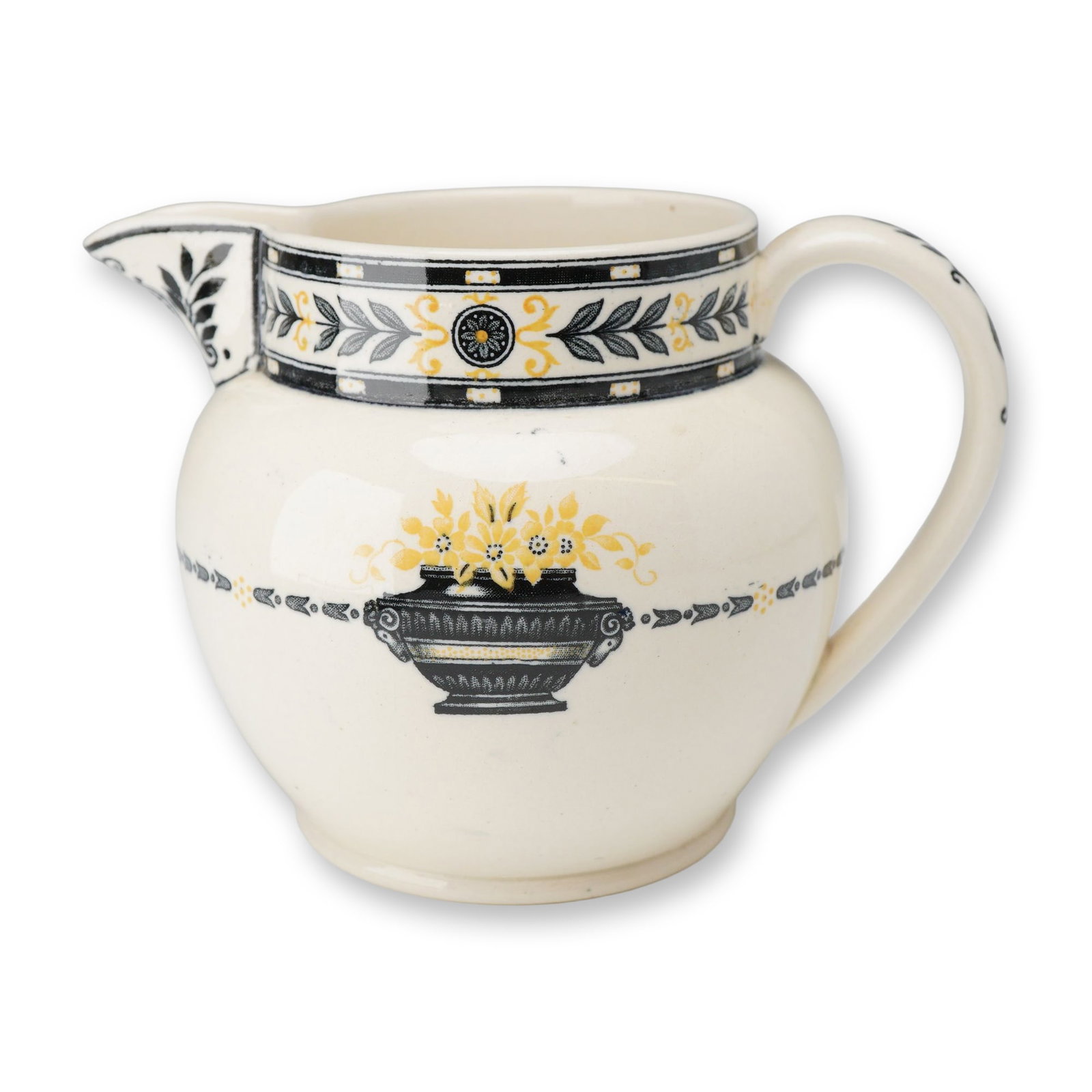 Wedgwood The Etruria Black Laurel Pattern Queen's Ware Cream Jug ca. 1930: This Wedgwood earthenware cream jug, dating to approximately 1930, features the Black Laurel pattern from The Etruria series. Constructed from cream-colored Queen's Ware, the vessel has a bulbous body