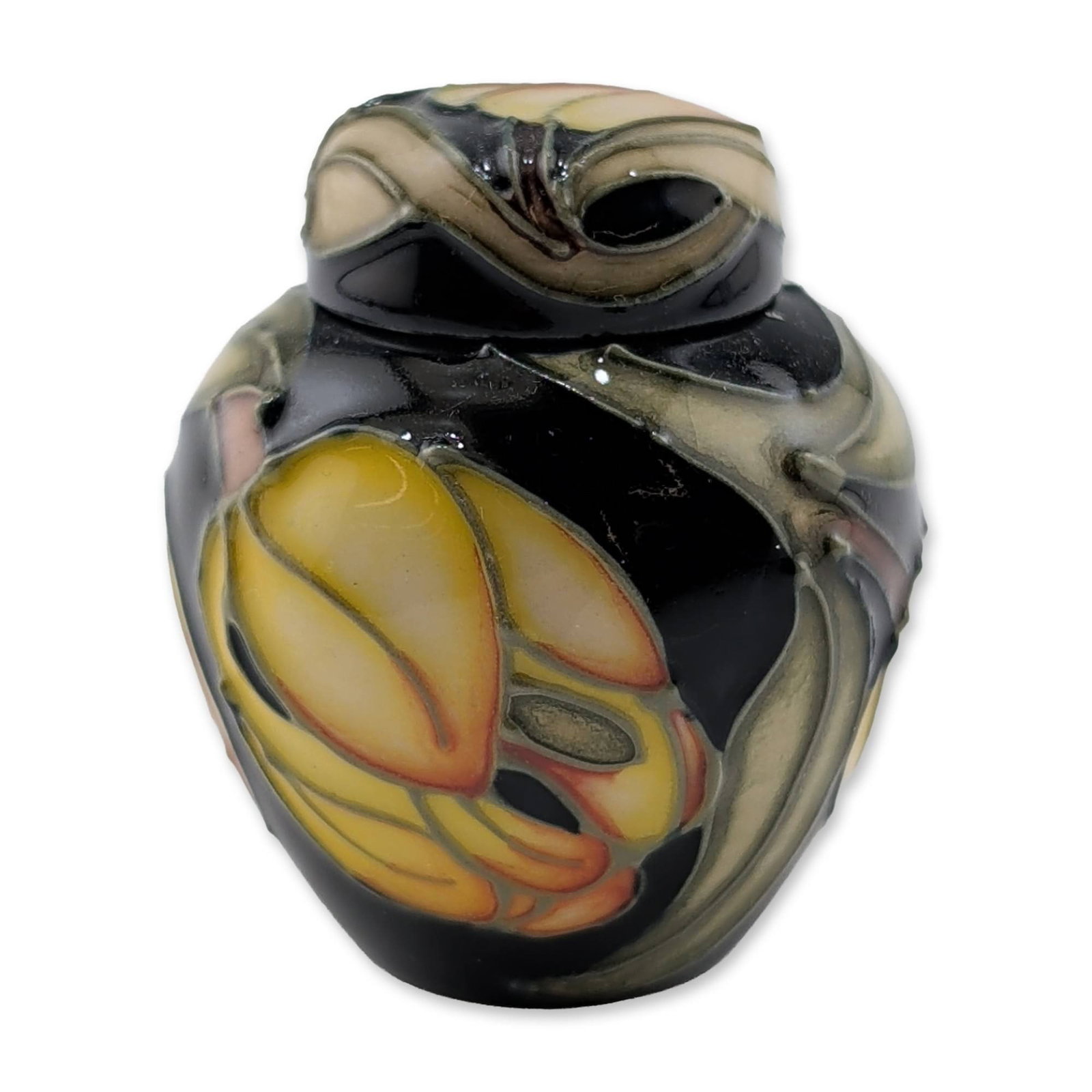 Moorcroft Pottery Miniature Ginger Jar with Lid, Figaro Pattern: Moorcroft, England, 2002. Miniature ginger jar with matching lid in glazed earthenware, featuring tubelined decoration in the Figaro pattern with yellow and orange floral motifs against a high-gloss b