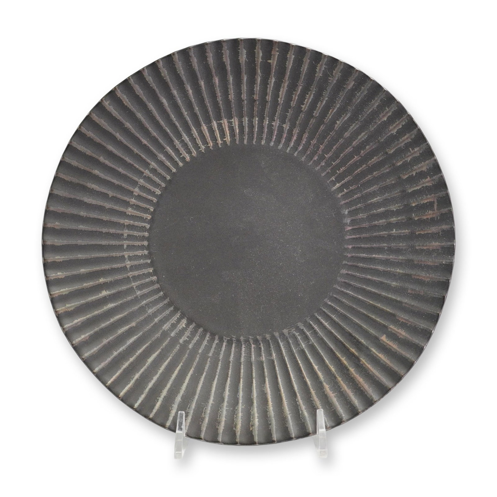Tokyo Design Studio Black Basalt Ceramic Plate: Tokyo Design Studio contemporary ceramic rimmed plate featuring a matte black basalt glaze finish. The wide, flaring rim is decorated with radial grooves in the Japanese shinogi style, with the glaze 