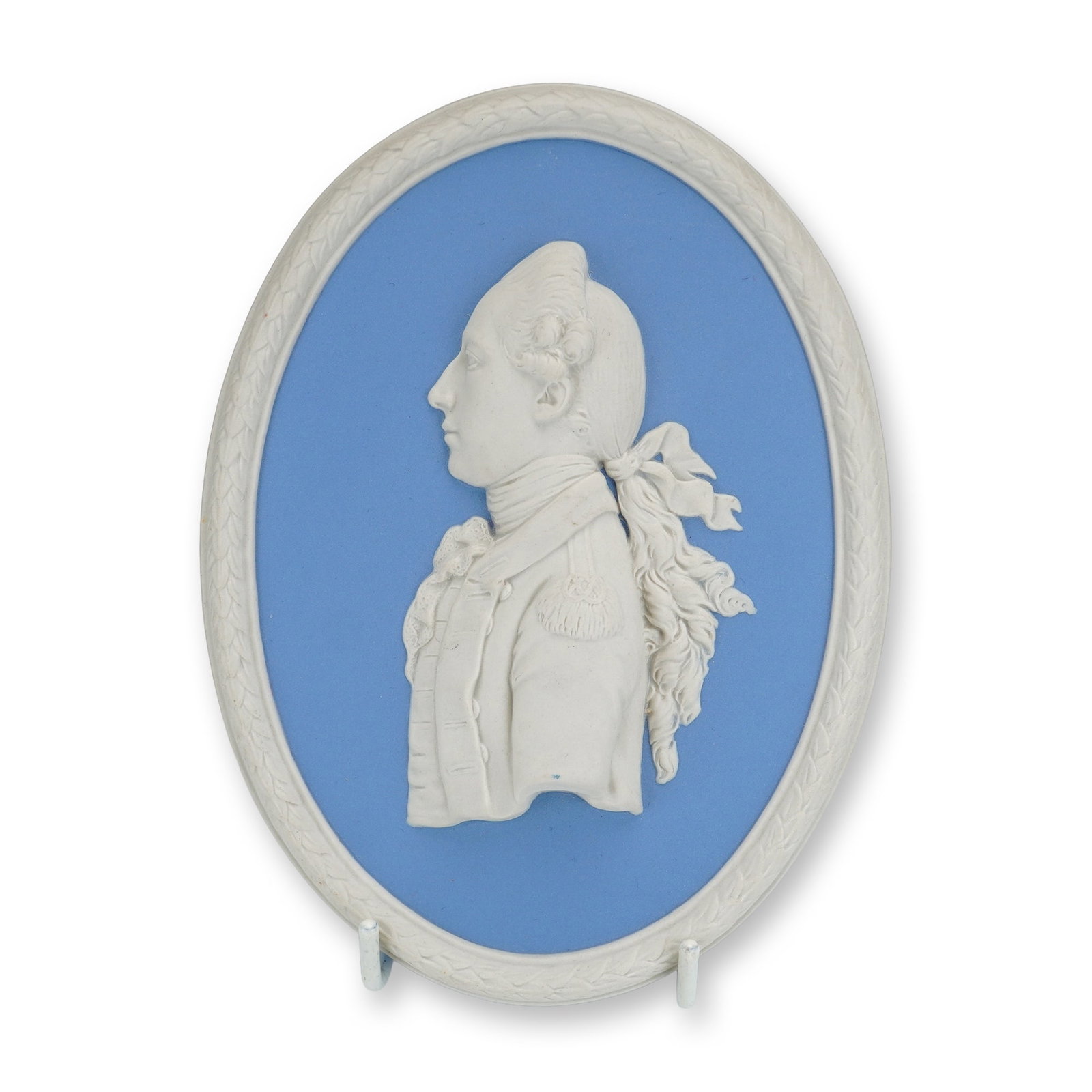 Wedgwood Blue Jasperware Oval Portrait Medallion Plaque, Captain Hamilton: This is a Wedgwood jasperware oval portrait medallion plaque featuring a white bas-relief profile of Captain Hamilton. The piece is crafted from fine-grained unglazed stoneware, characteristic of Wedg