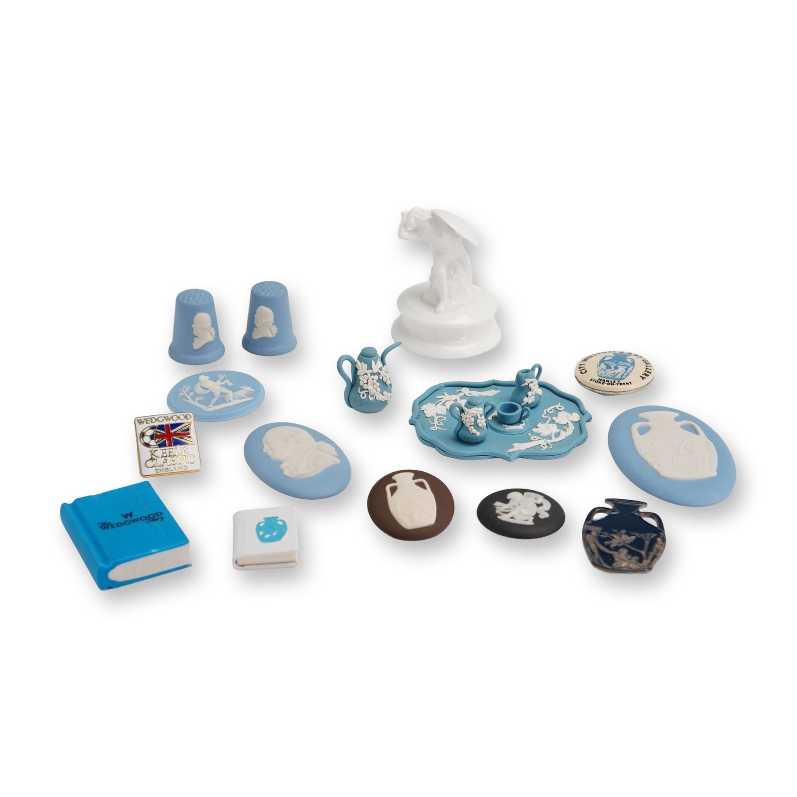 18pc Wedgwood Jasperware and Porcelain Miniature Items: This collection of 18 Wedgwood souvenir and miniature items includes pieces primarily made in jasperware, with additional examples in black basalt and terracotta. The group features a miniature tea se