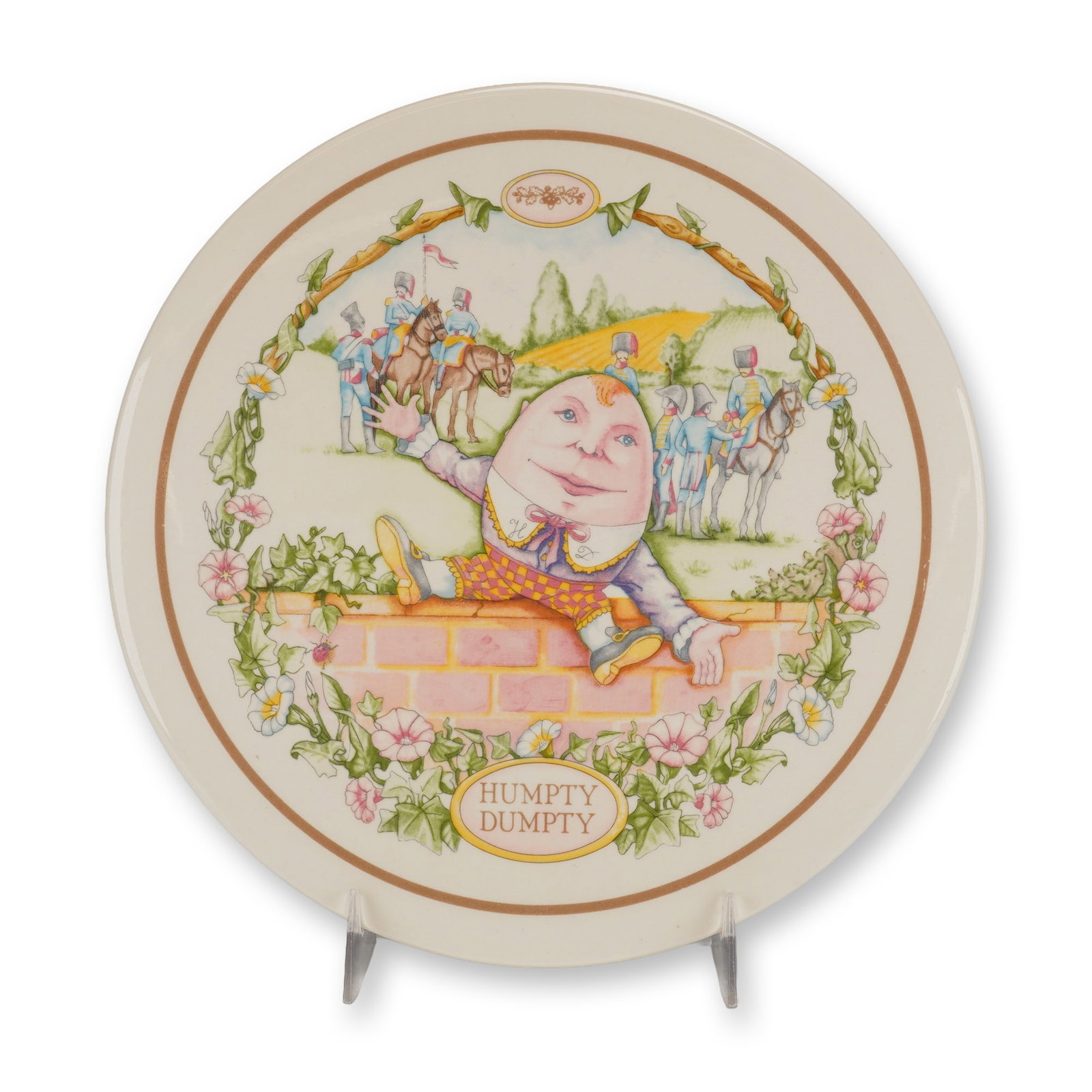 Wedgwood 1987 Nursery Rhymes Humpty Dumpty Porcelain Wall Plaque: This porcelain plaque was manufactured by Wedgwood in 1987 and is identified as the second in a series of five popular Nursery Rhymes. The circular plaque features a multi-color transfer-printed centr