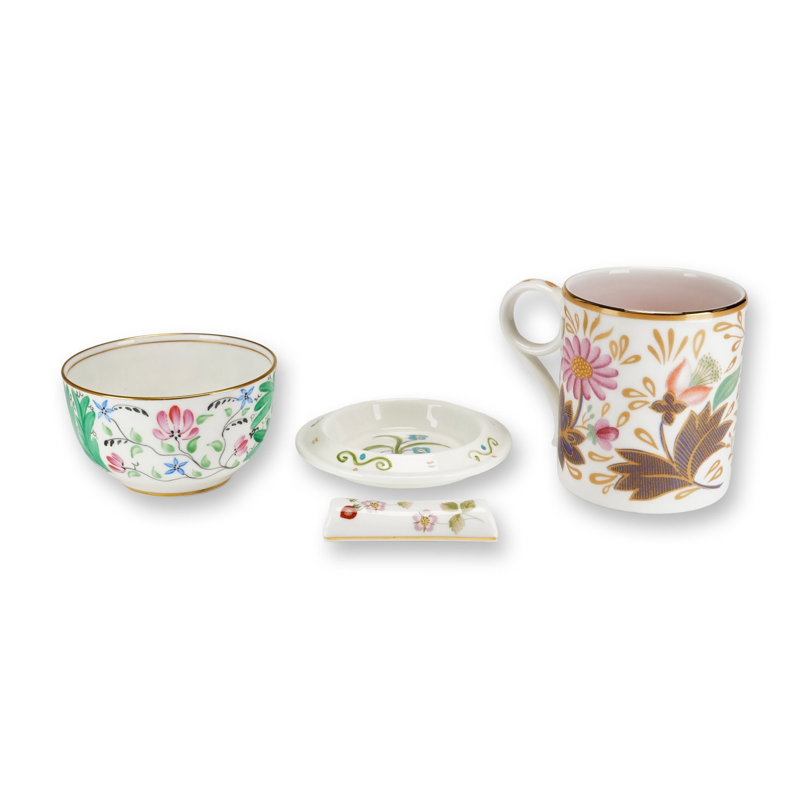 4pc Wedgwood Floral Decorated Items Including Mug Bowl Etruria Dish and Knife Rest: A four piece collection of assorted English fine bone china manufactured by Wedgwood. The group features various floral motifs and hand-painted or transfer-printed decorations with gilt accents. Each 