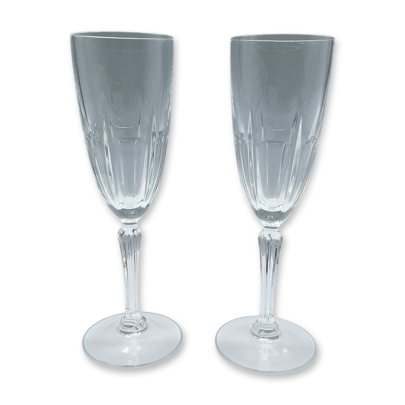 Pair of Vintage Crystal Champagne Flutes: A collectible highlighting Pair of Vintage Crystal Champagne Flutes. Beautiful duo of clear crystal in an elegant cut pattern. Unmarked. Dimensions: 7.75''H x 2.75''dia, Each Date or Era: 20th century