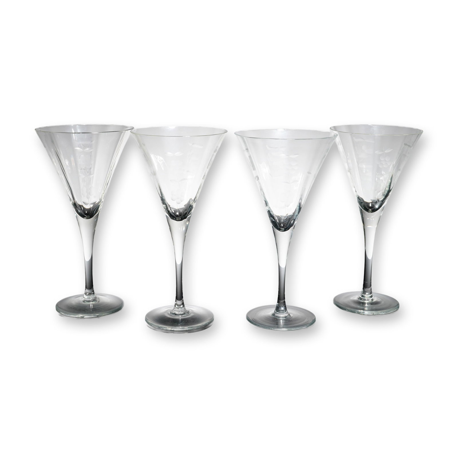 4-Piece Crystal Floral Motif Martini Glasses: A collectible highlighting 4-Piece Crystal Floral Motif Martini Glasses. Each glass presents a conical bowl decorated with etched floral and foliate sprays arranged vertically. The bowls are joined to