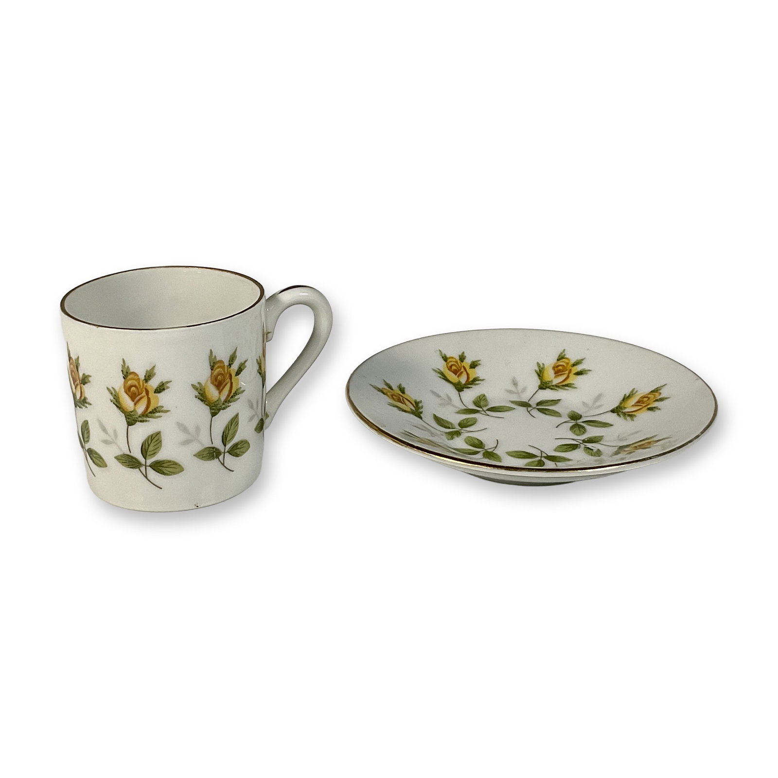 2-Piece Vintage Yellow Rosebud Demitasse Cup and Saucer: A collectible highlighting 2-Piece Vintage Yellow Rosebud Demitasse Cup and Saucer. Set of porcelain espresso cup and saucer adorned with charming yellow rosebud patterns. Cup with handle: 3"L x 2.25"